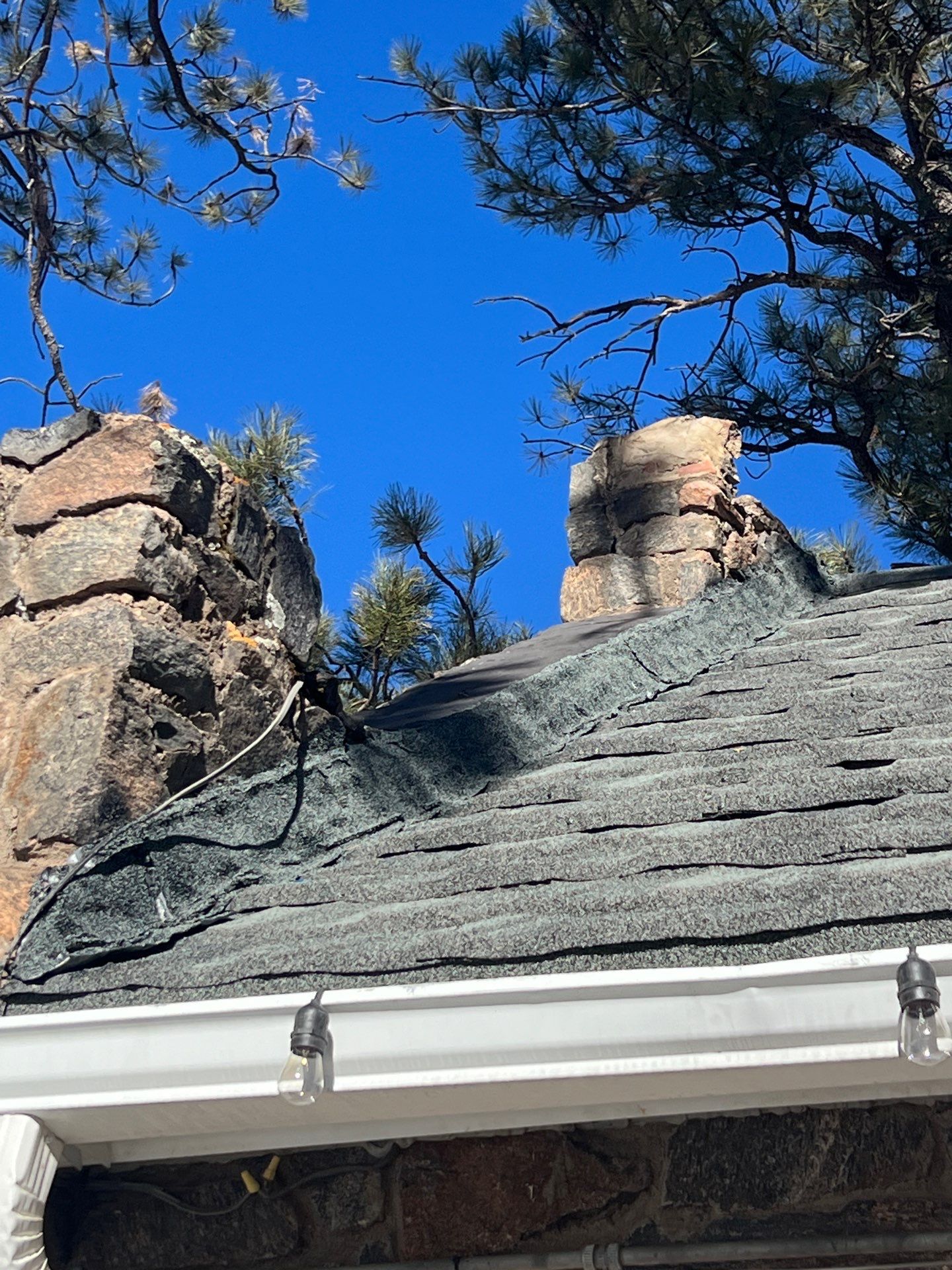 Residential Roofing Installation using Stone Coated Steel by Blue Peaks Roofing LLC 