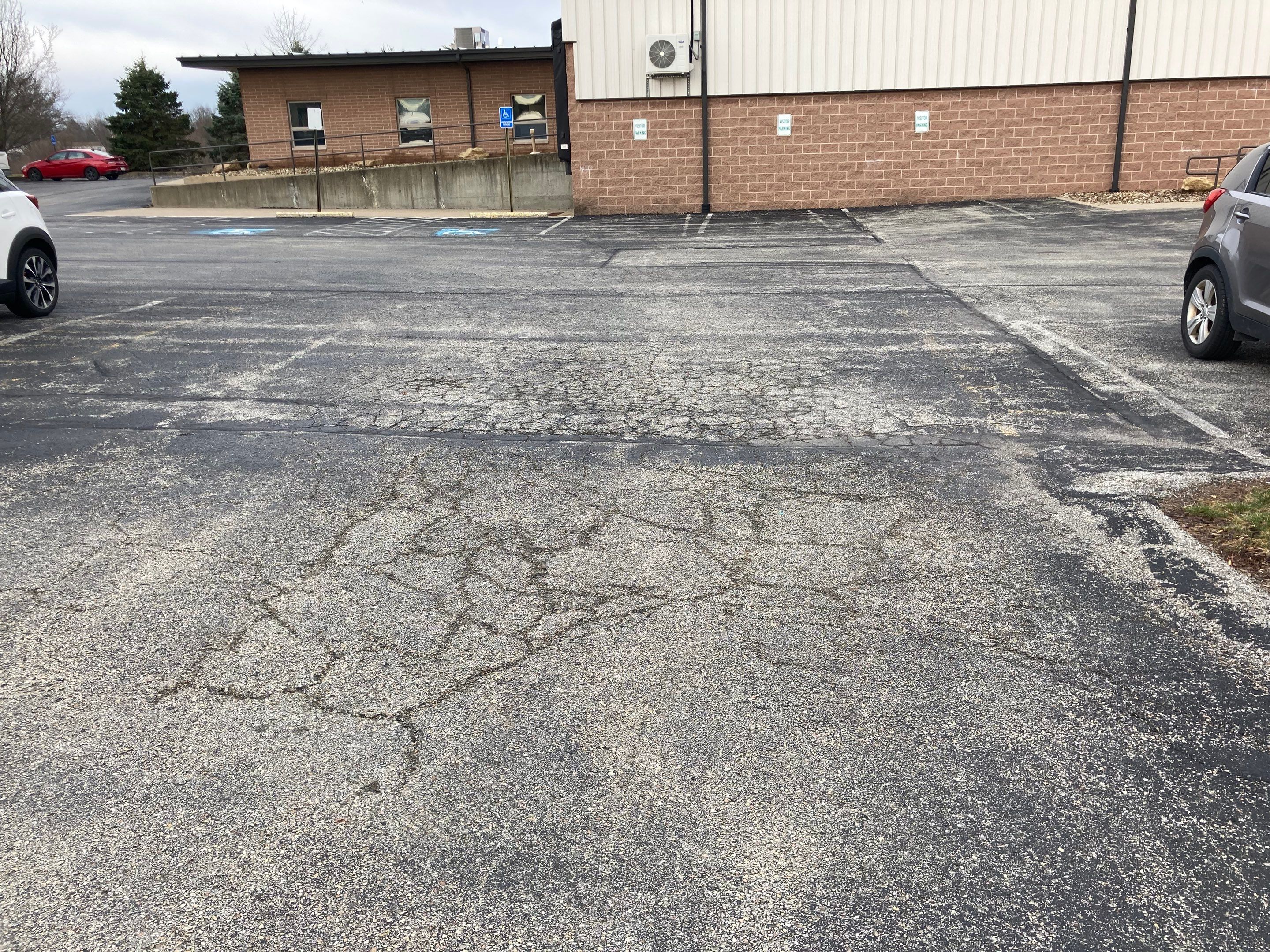 Asphalt Resurface Commercial Park Lot using asphalt by Brant's Asphalt