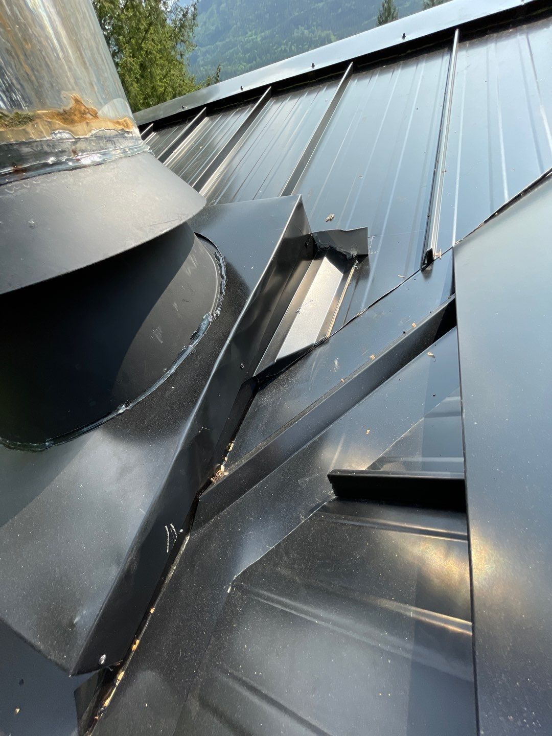 Residential ReRoofing Installation using 12" Prolok metal by Top Notch Roofing Inc