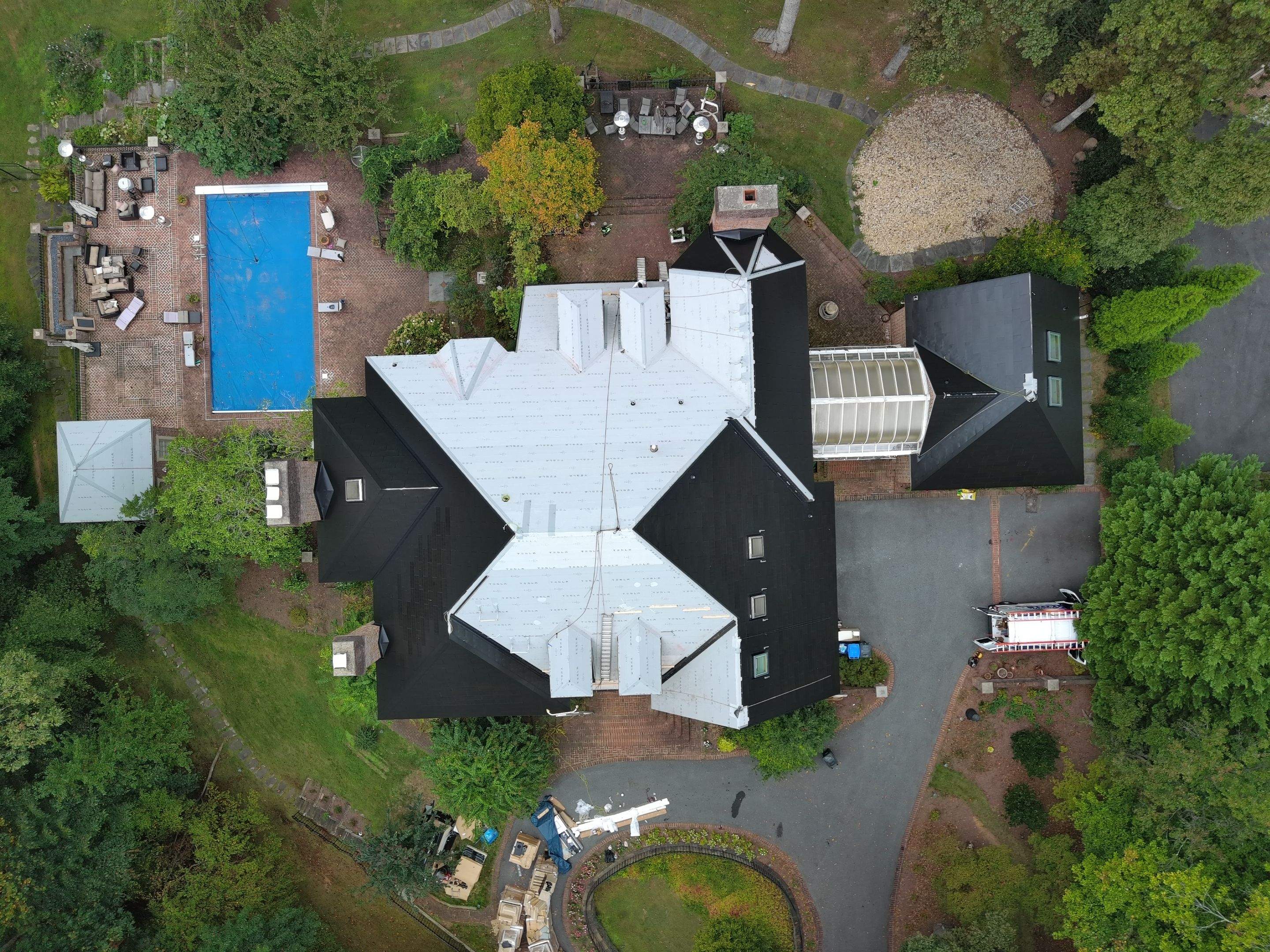 Extravagant Tesla Solar Roof in Maryland by American Home Contractors