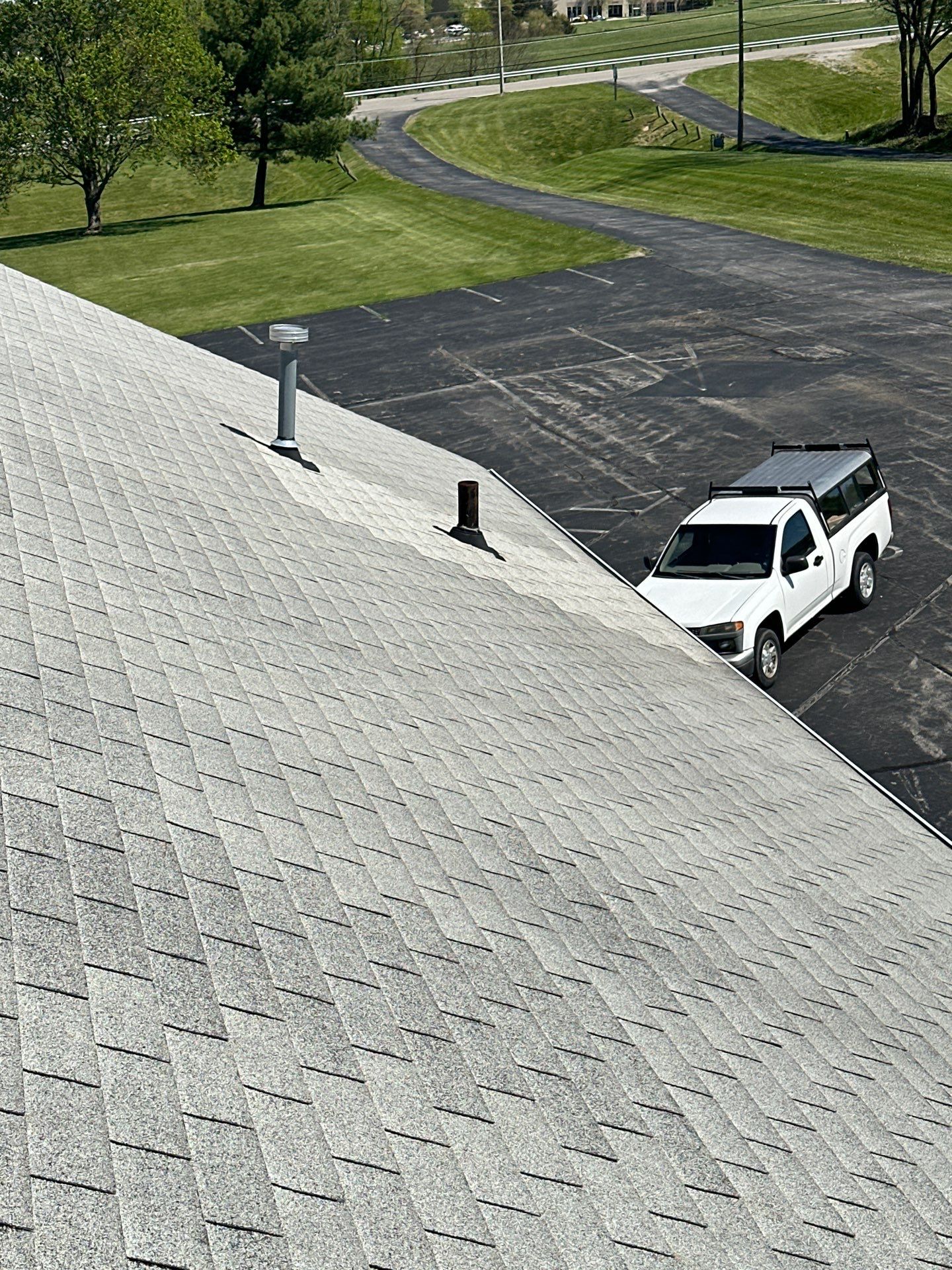Commercial Roofing Installation using Performance Shingles by Mr. Roofer