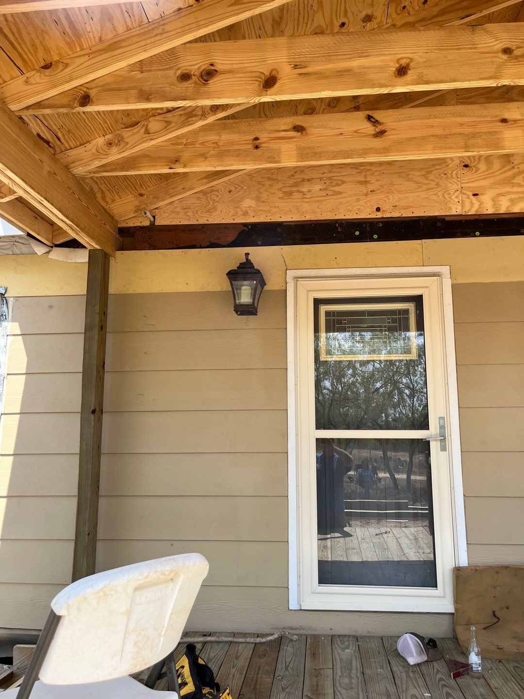 Front Porch Sitt'n by Bayfront Roofing and Construction
