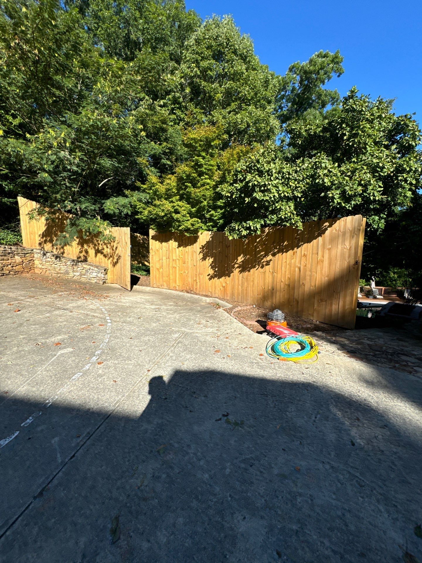 Atlanta Exterior Refresh Featuring Wood Privacy Fence and Door Painting by Swift Home Renovations