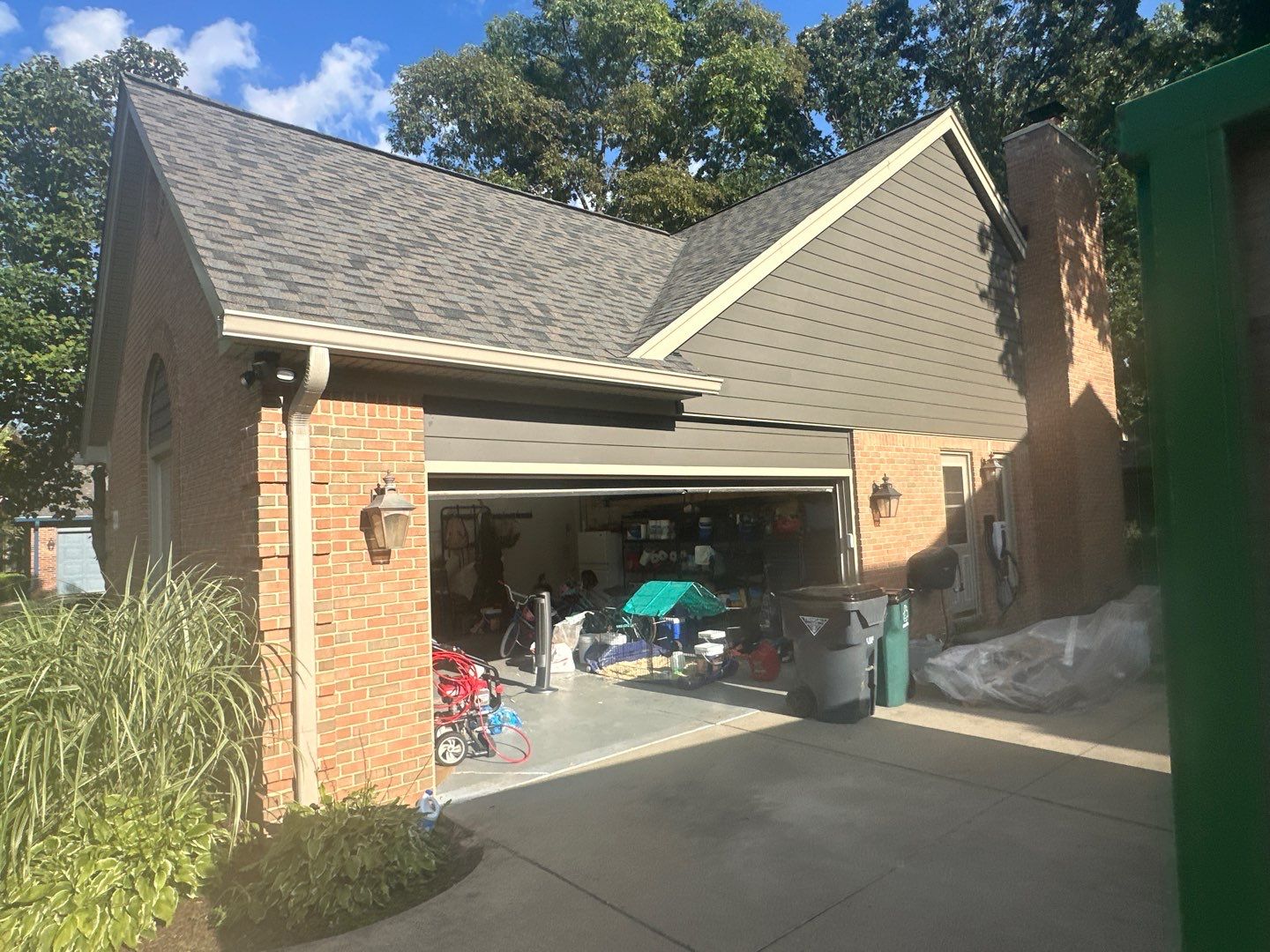 Roof Replacement using Owens Corning Peppercorn and Siding Replacement using Ascend Charcoal Smoke by 180 Contractors