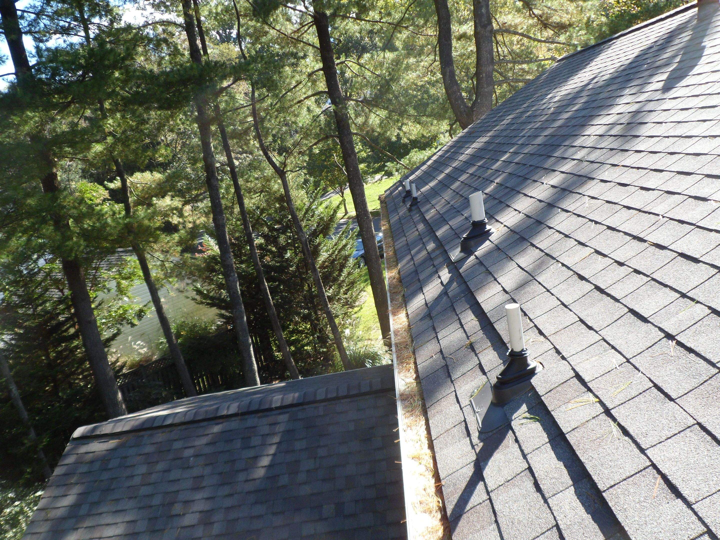 Residential Roofing Installation using Landmark Shingles Color Weatherwood by Alpha Design Services
