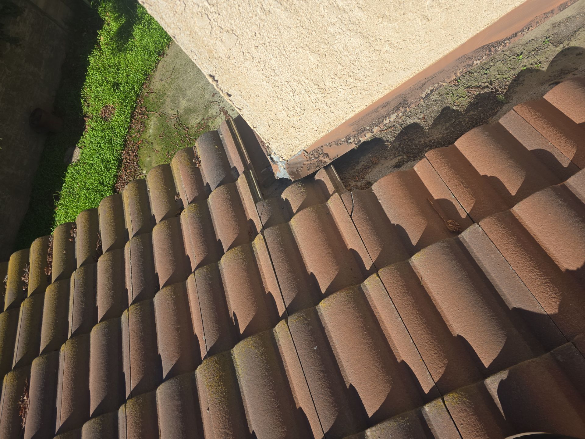 Tile Roof repair by Grandmark Service Company
