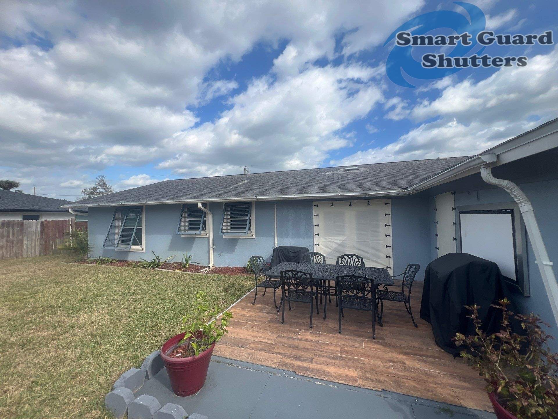 Hurricane Protection in Blue Grey by Smart Guard Shutters