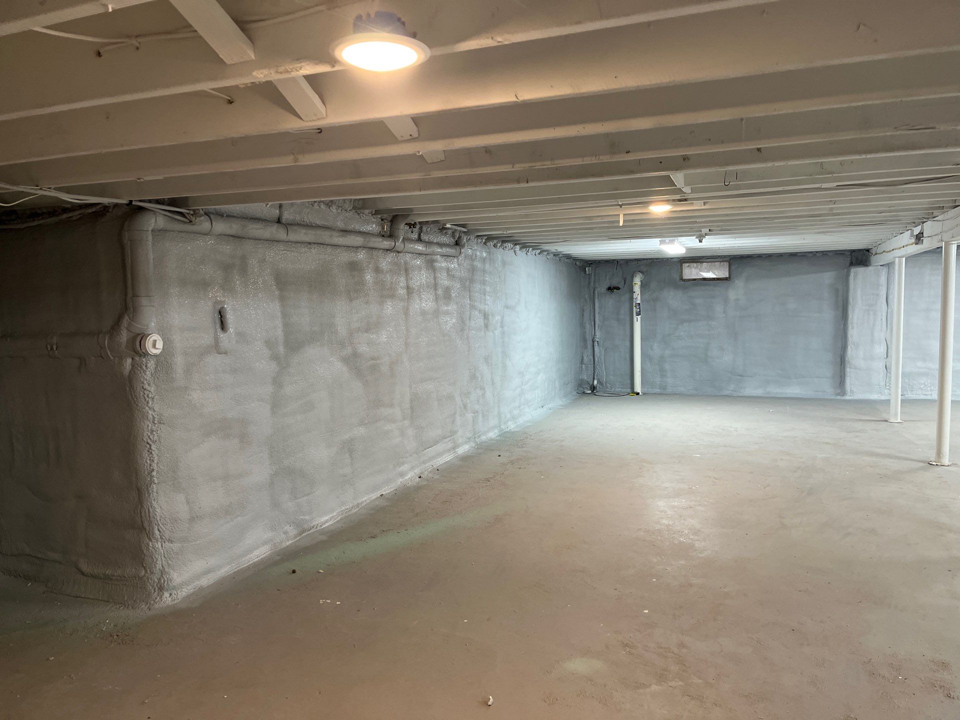 Basement Exterior Walls using Closed Cell Spray Foam by NYS Foam & Energy