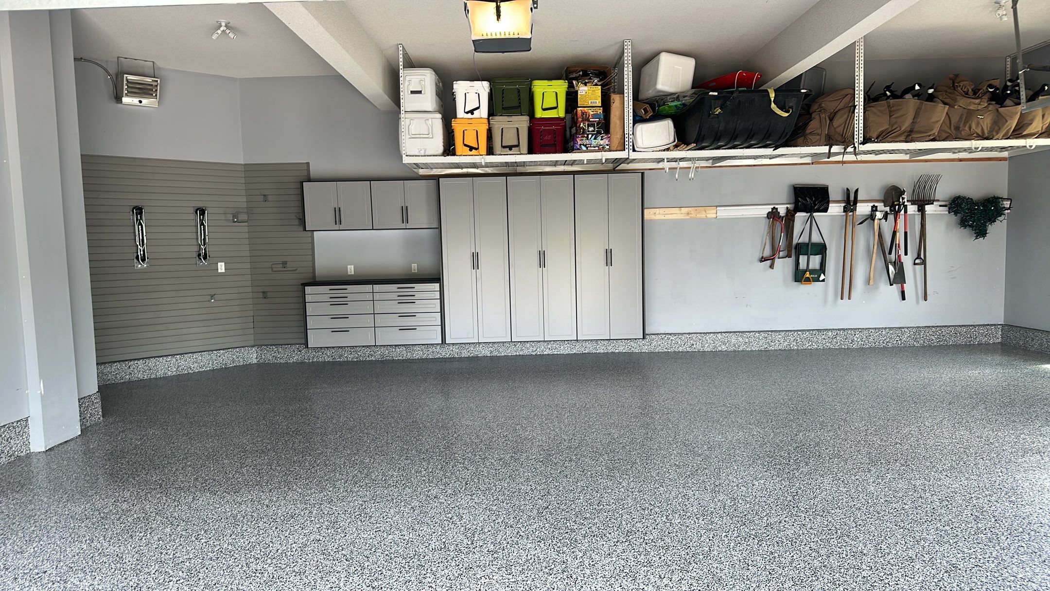Matt N. took his garage to the next level with our Domino floor and cabinets by Banner Garage