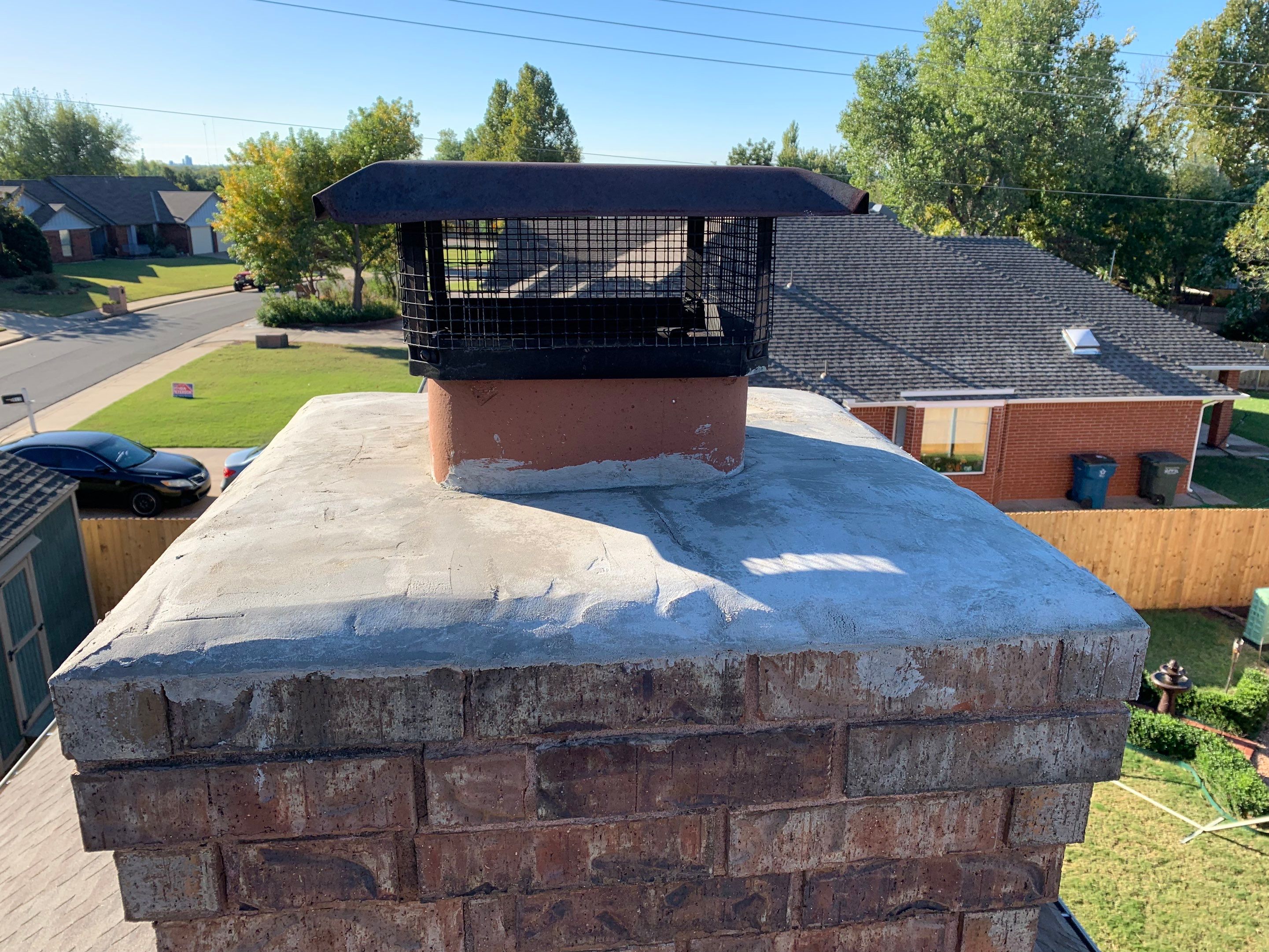 chimney repair & gutter installation in Edmond by McCann's Roofing and Construction