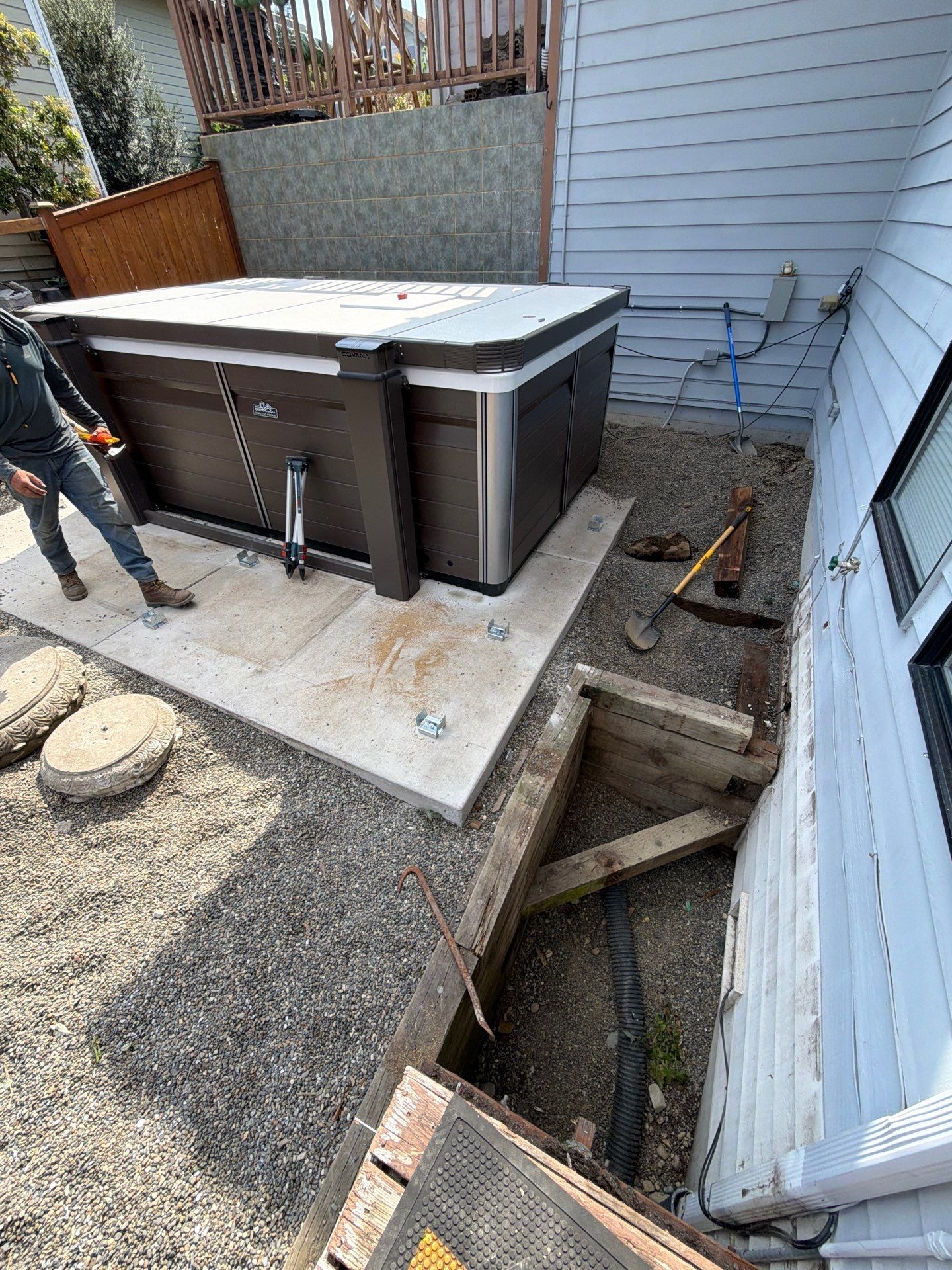 Tacoma Custom Composite Deck and Hot Tub Surround with Retaining Wall by Emerald City Energy 