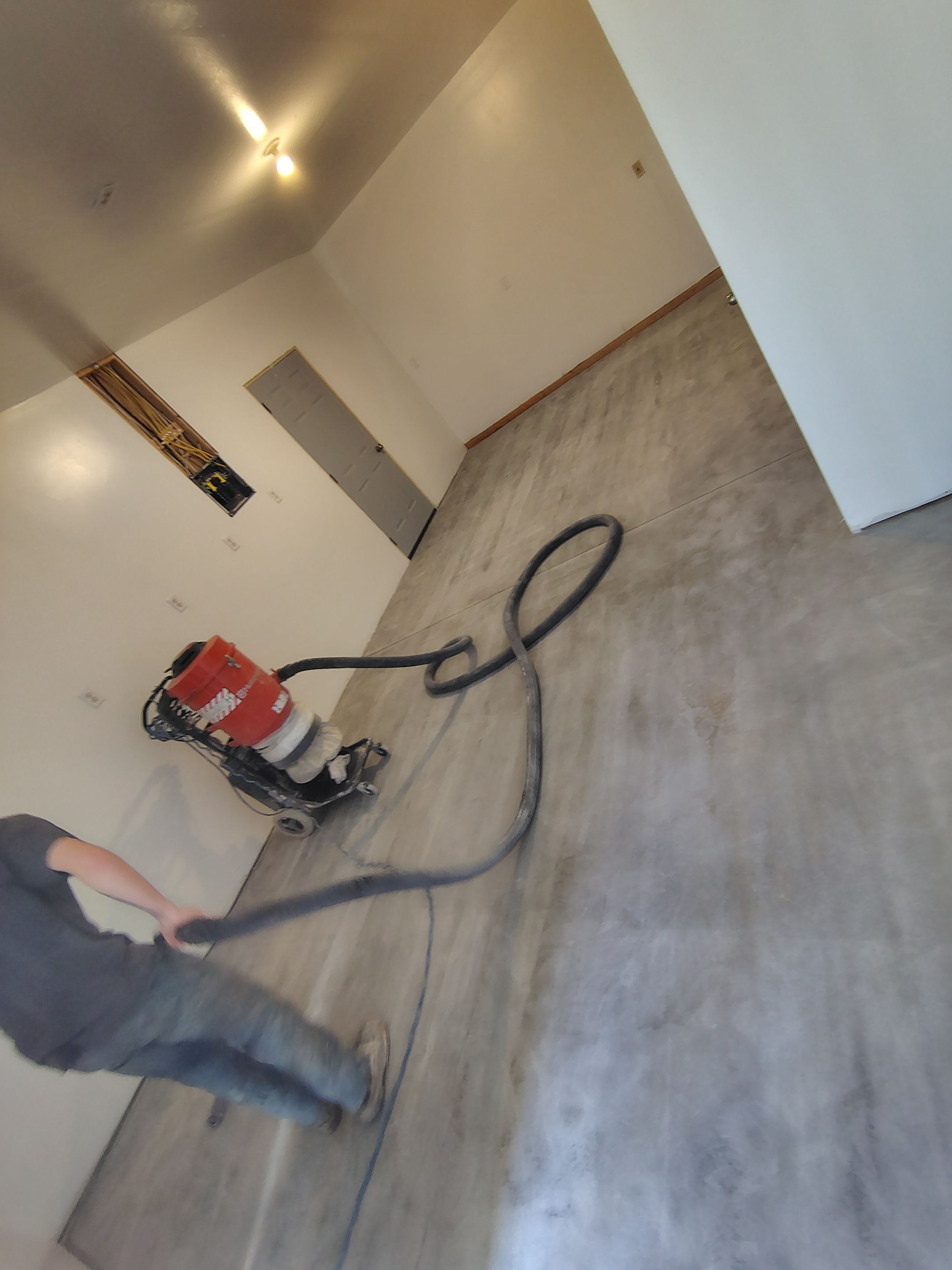 Decorative Chip Concrete Coating Installation in Luverne by Select Painting, Coatings & Garage Cabinets