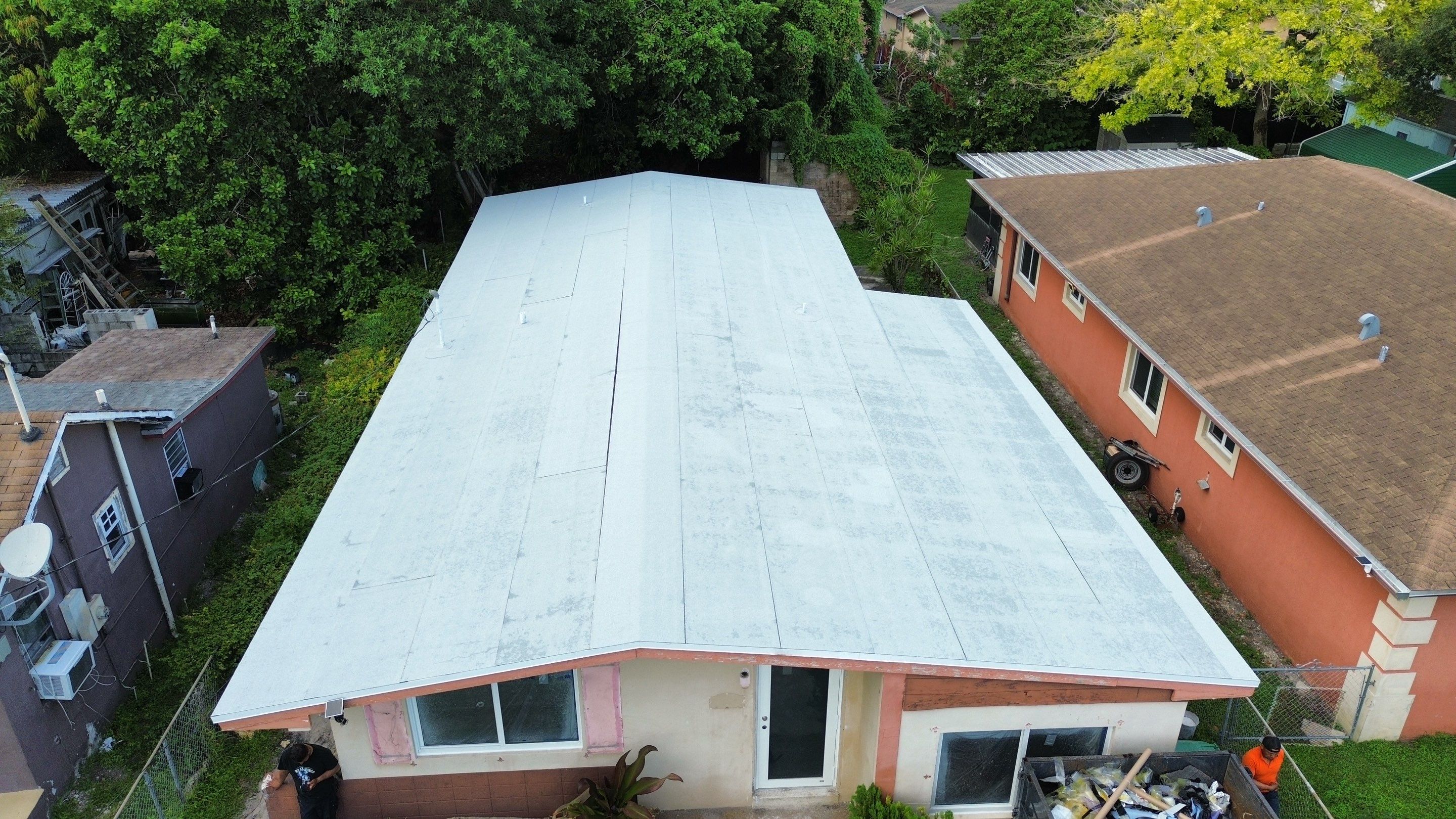 Residential Roofing System Replacement and Deck Repair in Northwest Neighborhood