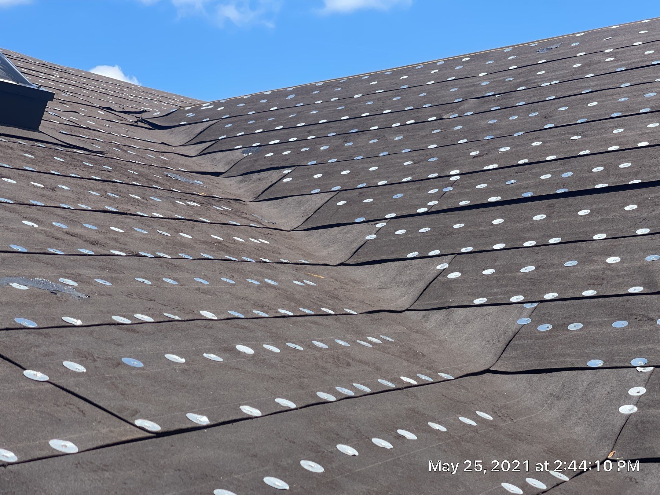 Residential Roofing Installation using 1" Nail strip metal roof by BLUES BROTHERS ROOFING