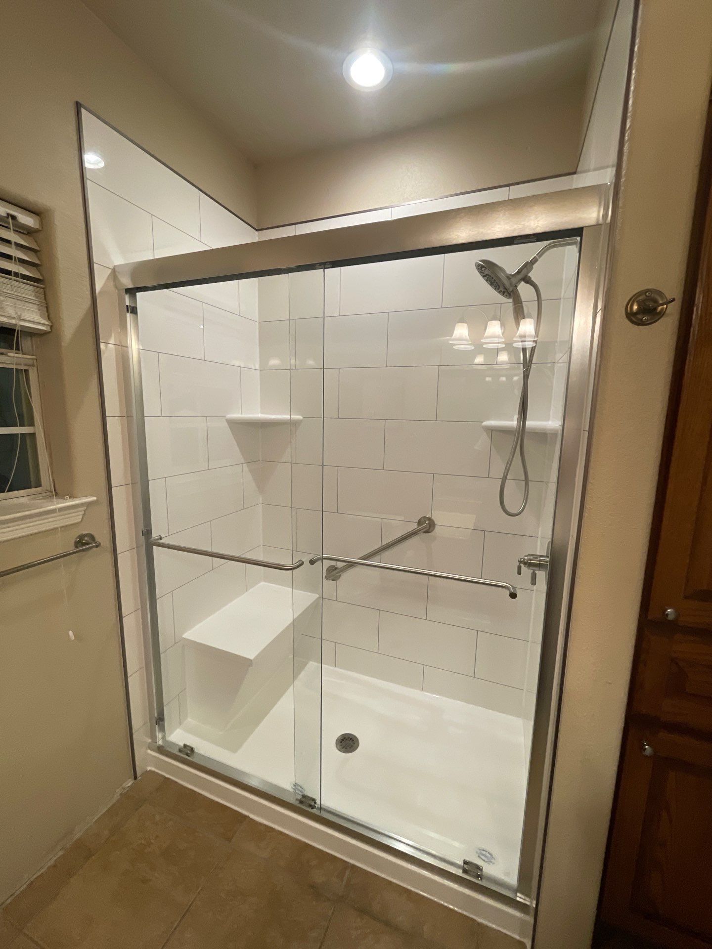 New low-threshold walk-in shower in Giddings by Lane Lauritsen - The Hill Country, Texas