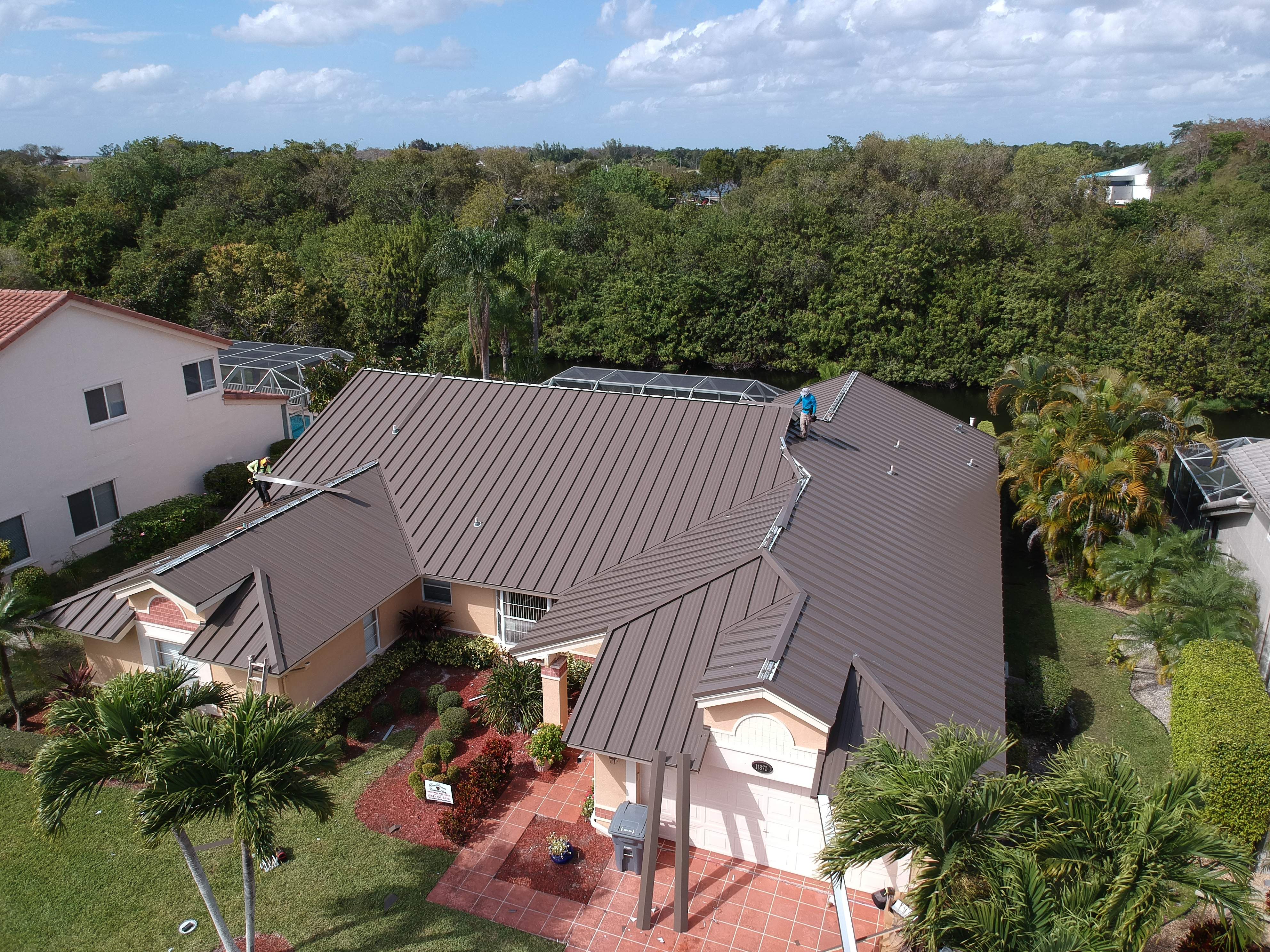 Residential Roofing Installation using 1" Nail strip metal roof by BLUES BROTHERS ROOFING