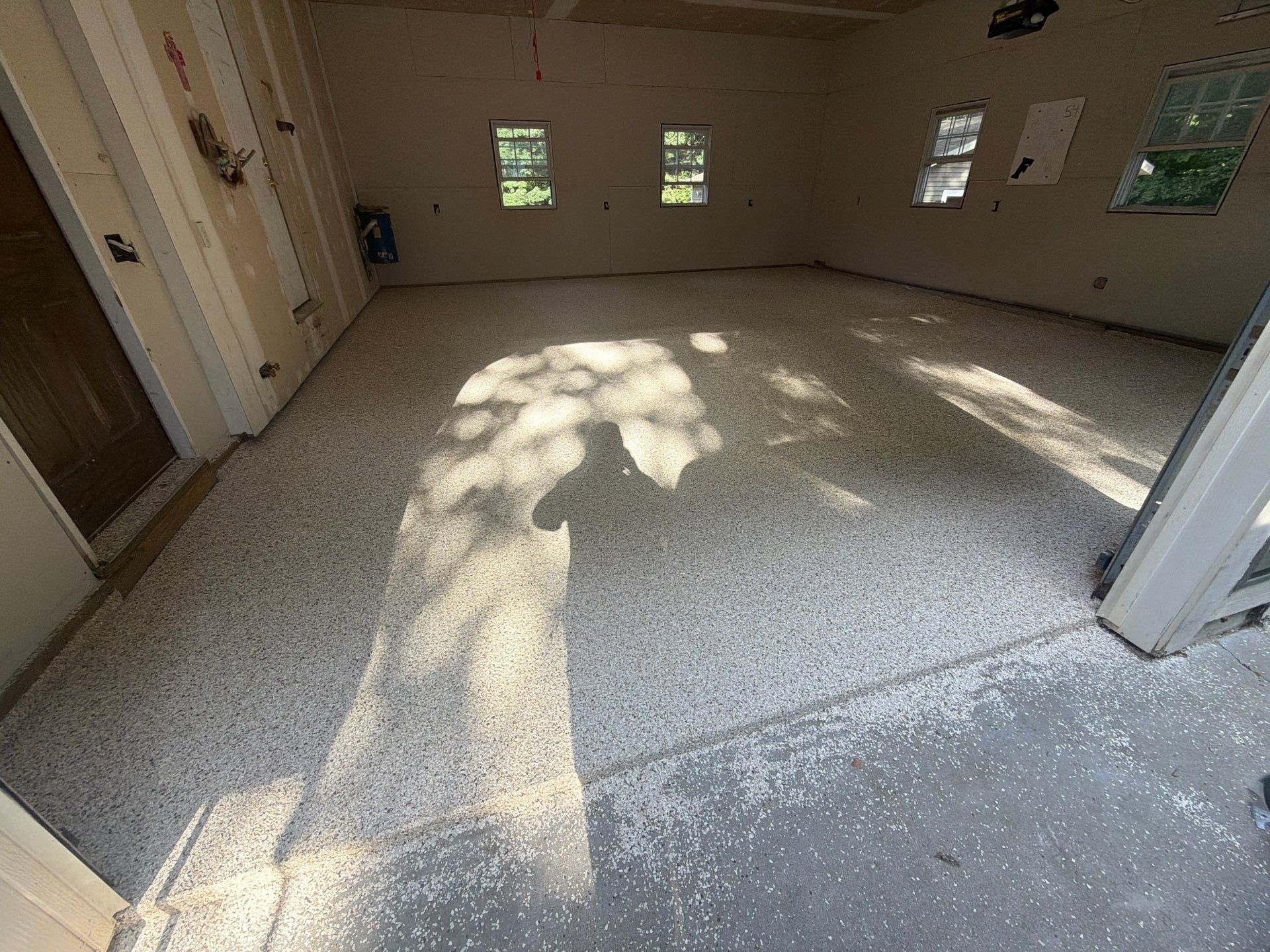 Garage Epoxy Floor Coating with Speckled Flake Finish in Fruitport by Gordon Painting