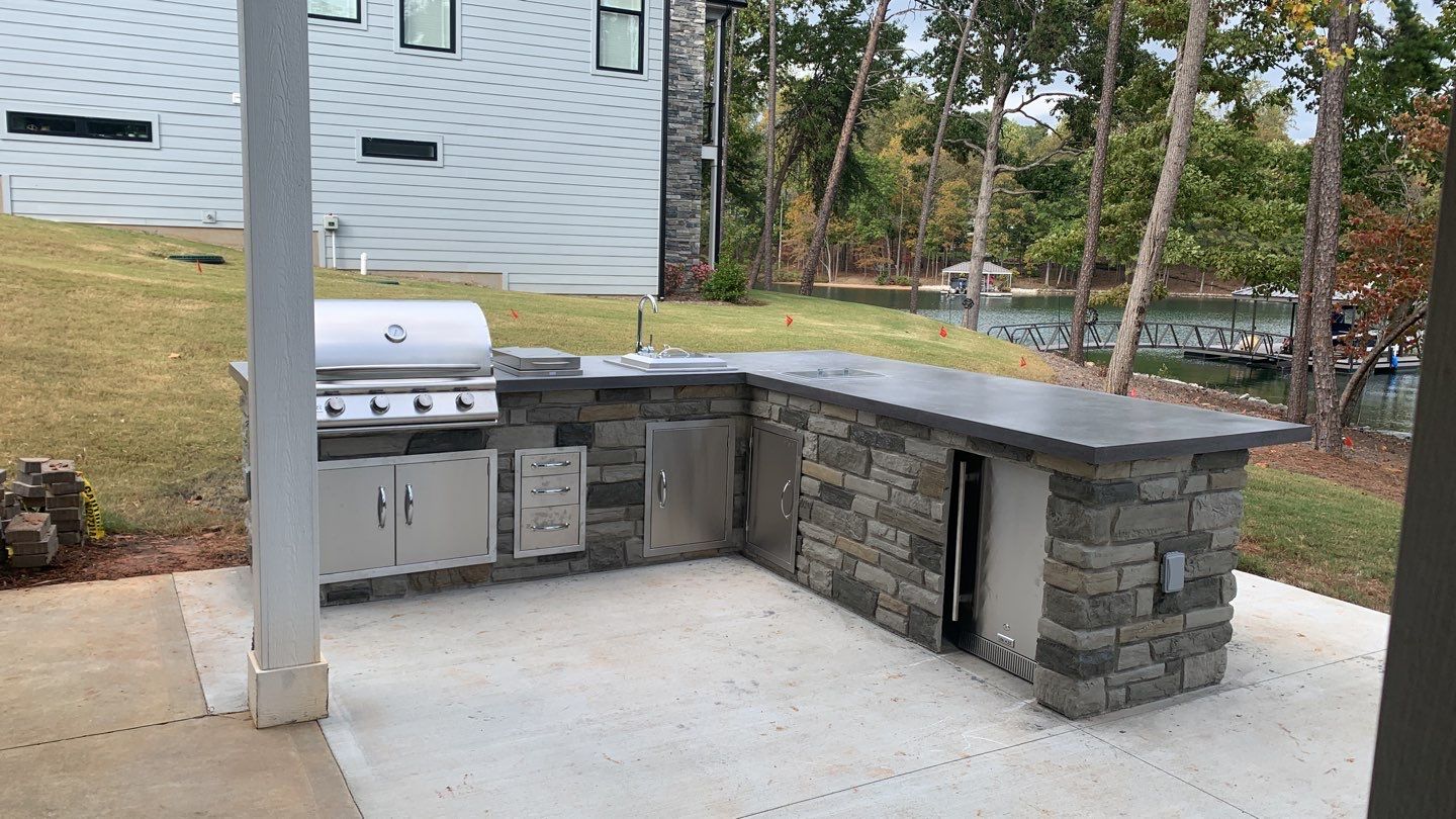 Outdoor Kitchen on Lake Keowee by Xtreme Concrete Services