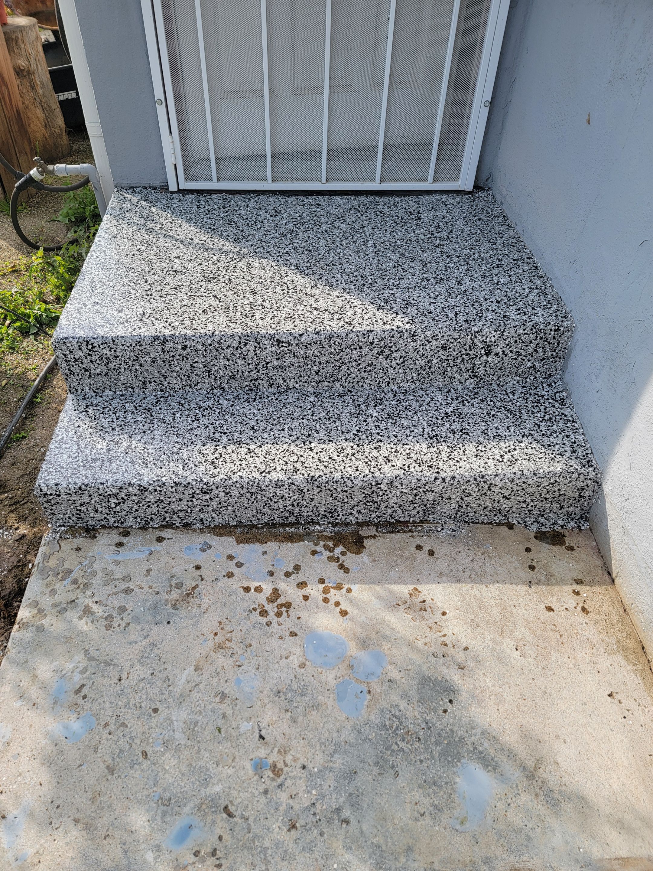 Front Porch and walkway by MGP Coatings