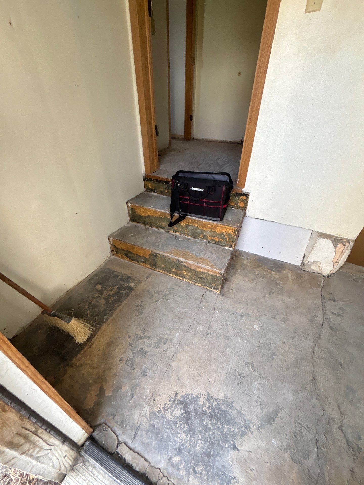 Comprehensive Basement Concrete Floor Coating and Crack Repair in Sioux Falls by Select Painting, Coatings & Garage Cabinets