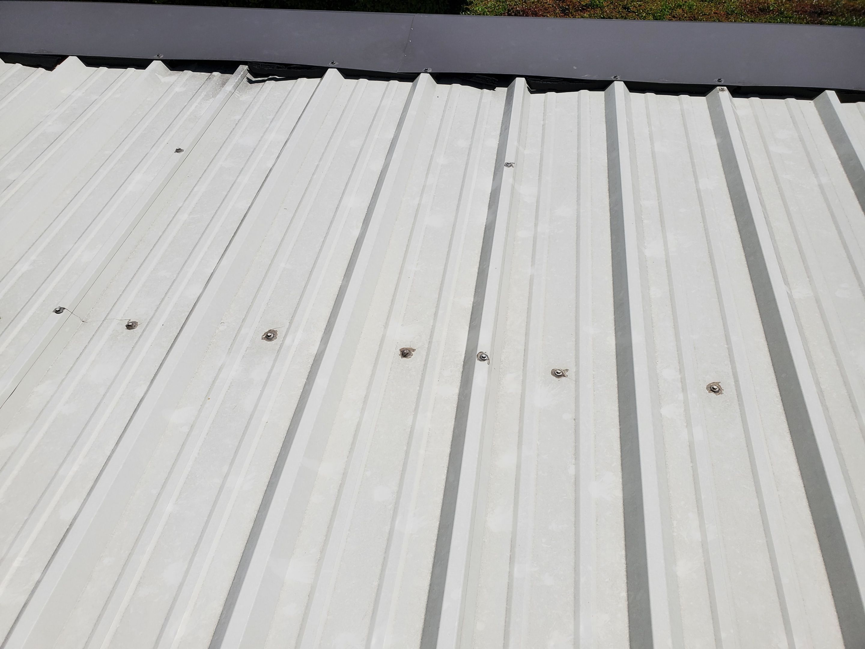 Commercial Roofing Installation using Double lock Mechanical Standing Seam Metal by Becker Roofing and Exteriors