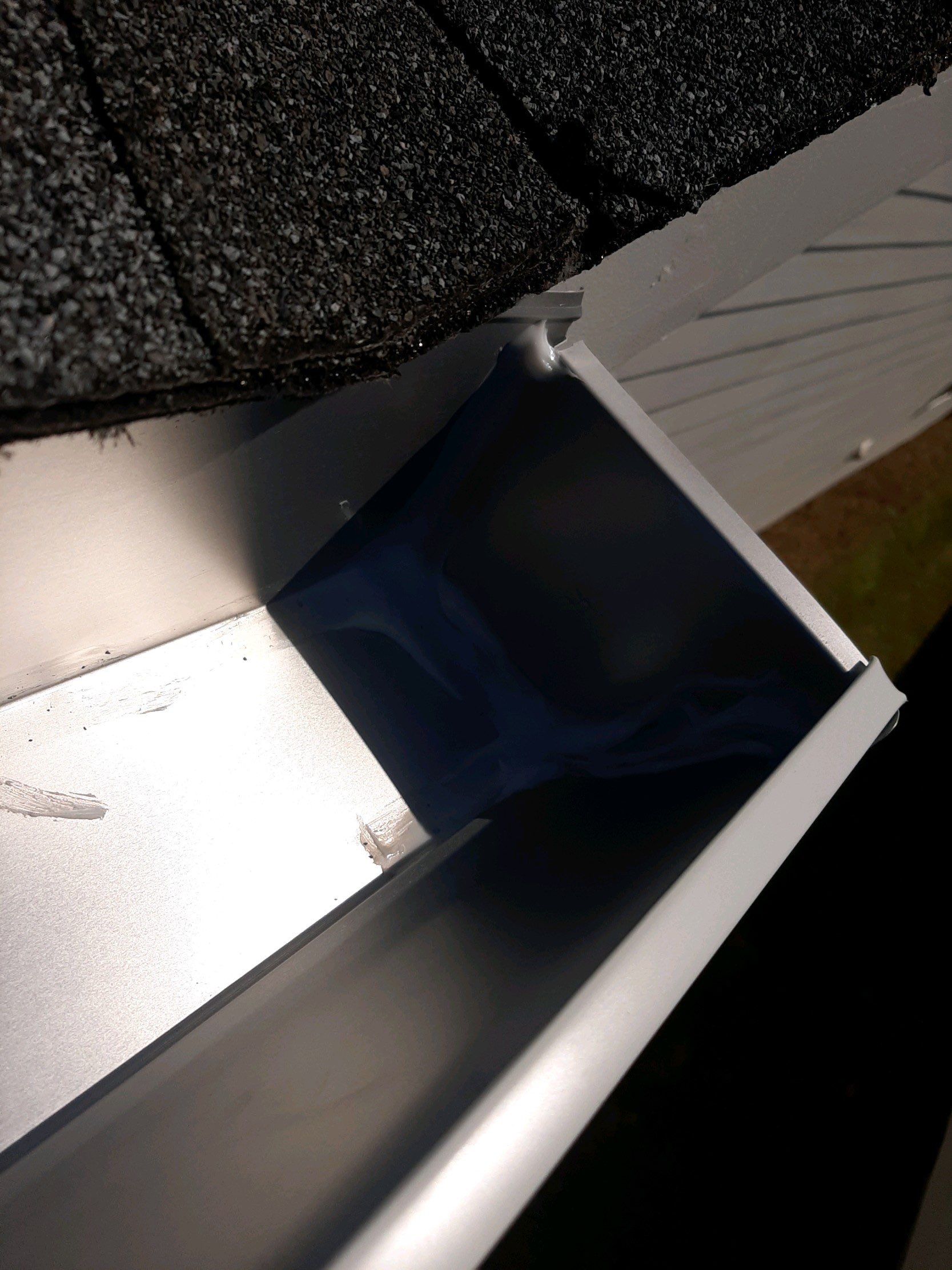 Gutter Installation Using White K-Style Aluminum Seamless Gutters by Gutter Professors
