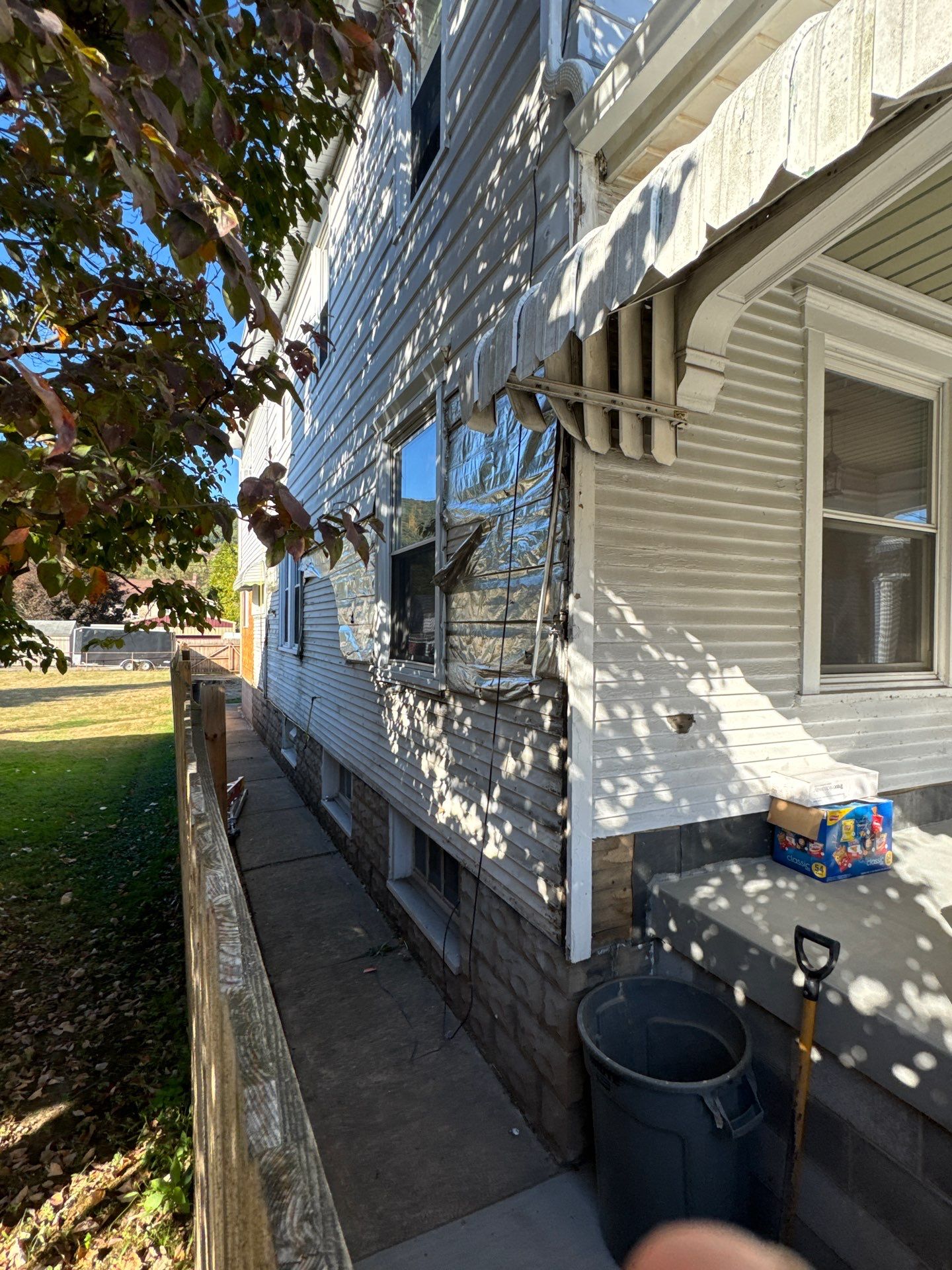 Charcoal Metal Roof & Blue Siding — A Refreshing New Look by Esh Builders