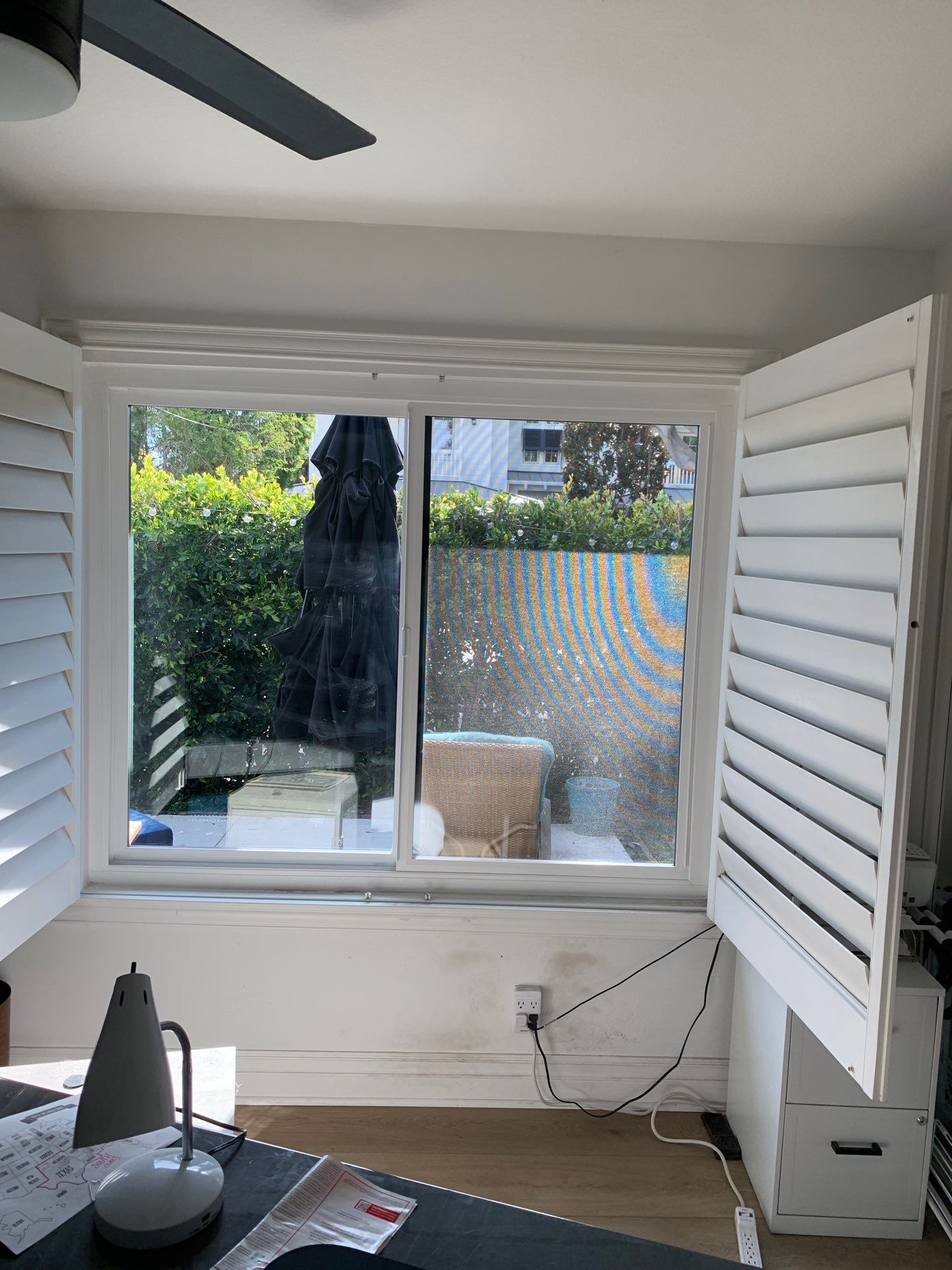 Window Installation using Milgard black vinyl windows by American Window Company