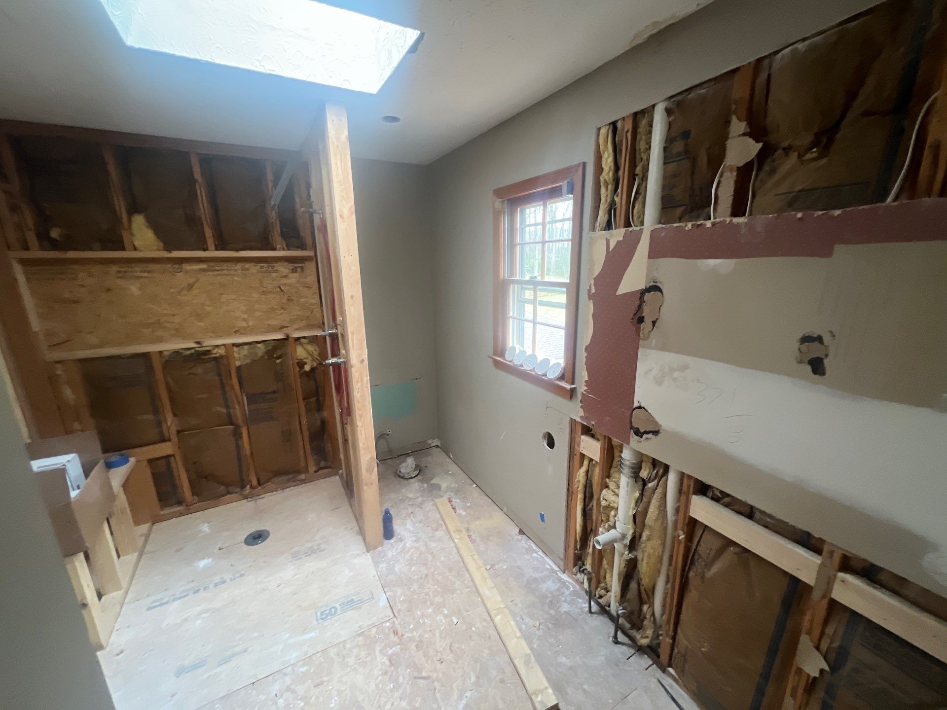 Modern Bathroom Remodeling Featuring Marble Tiles and Custom Cabinetry in Smyrna by Swift Home Renovations
