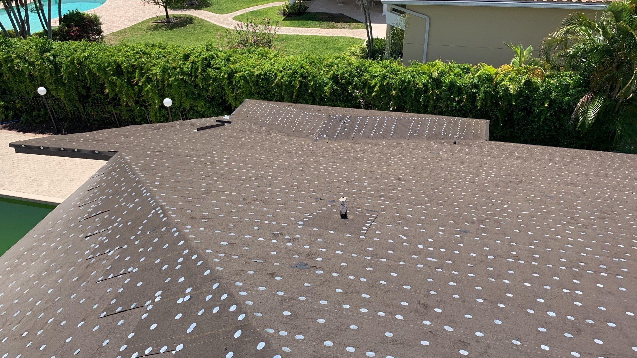 Residential Roofing Installation using 1" Nail strip metal roof by BLUES BROTHERS ROOFING