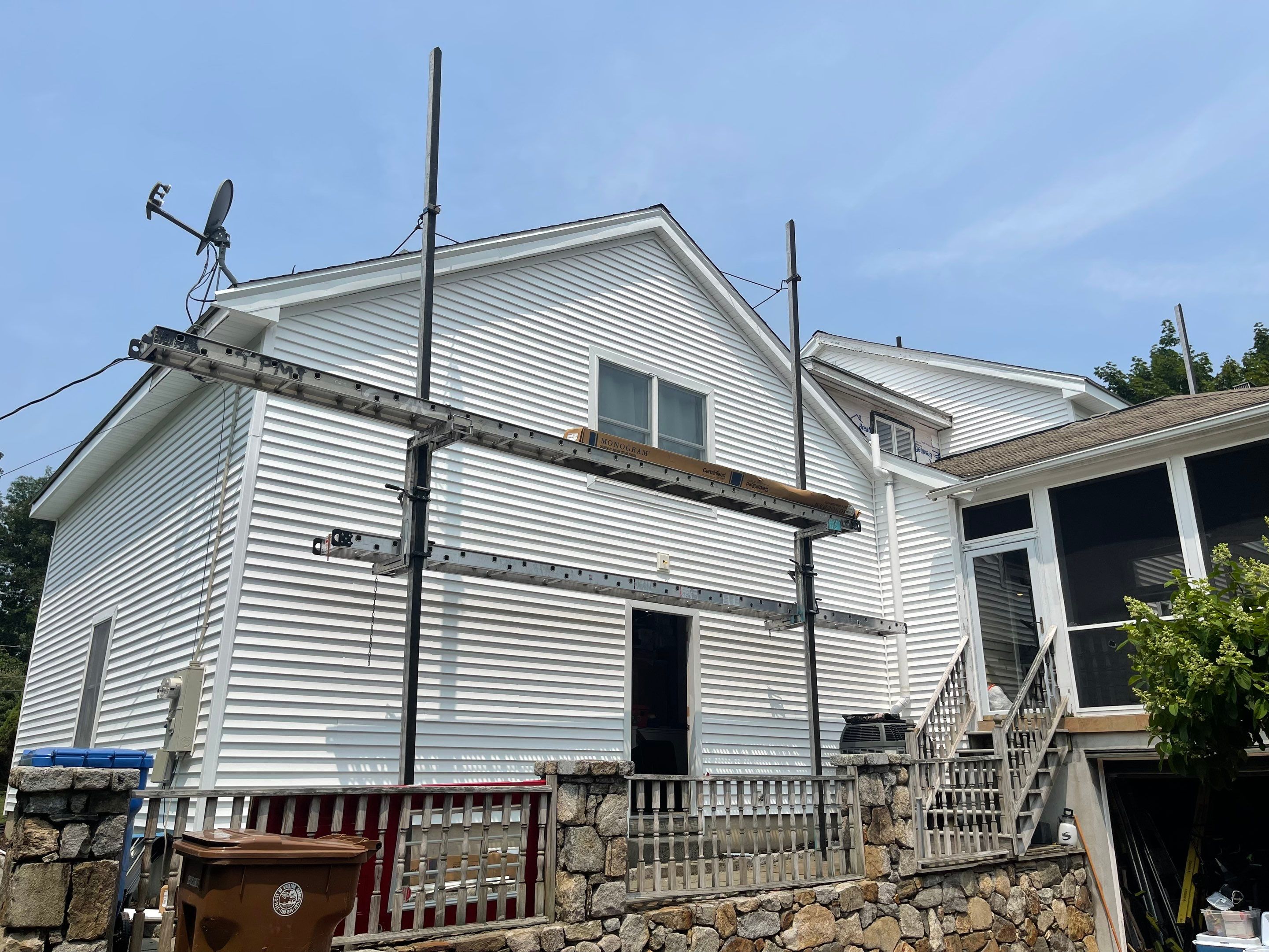 Siding Installation using Mainstreet Colonial & White gutters by A Plus Exterior