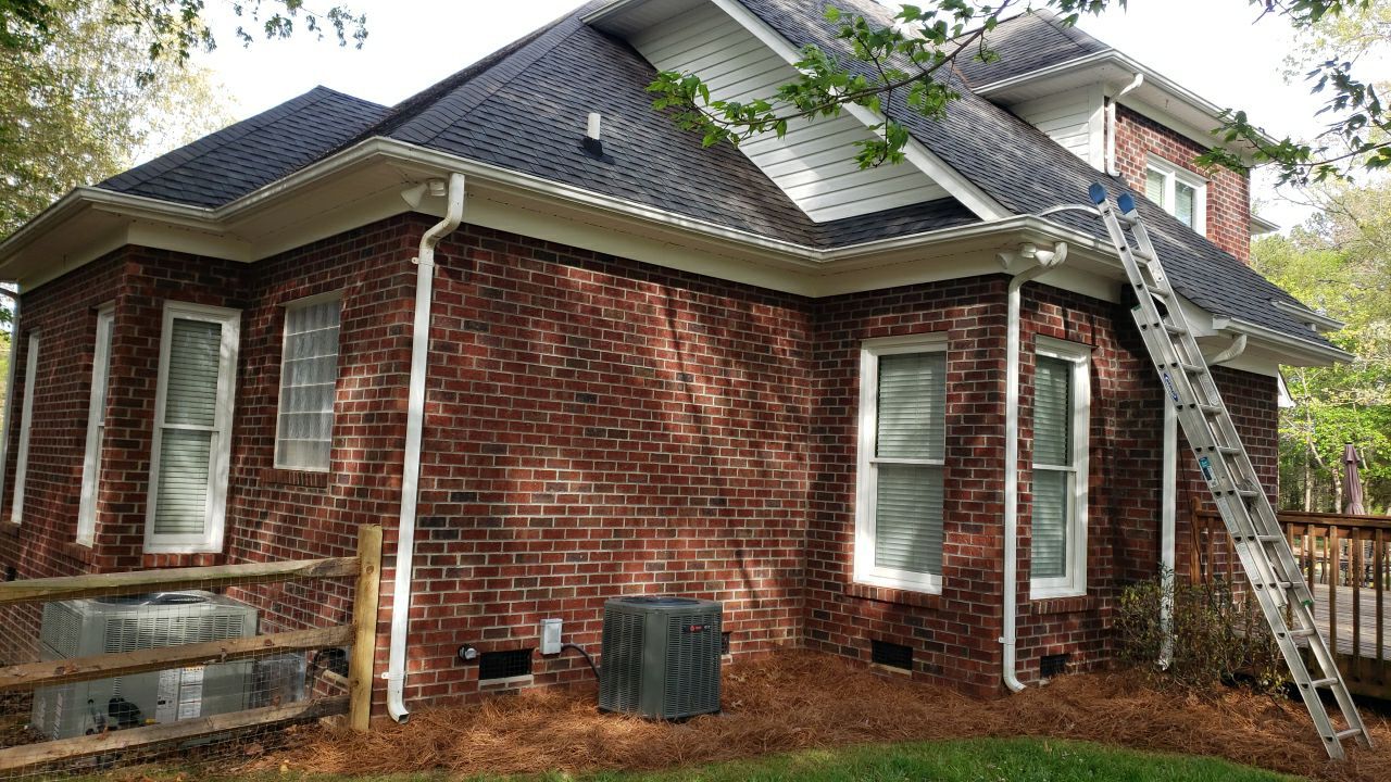 House Wash using cleaner by Power Wash Masters LLC