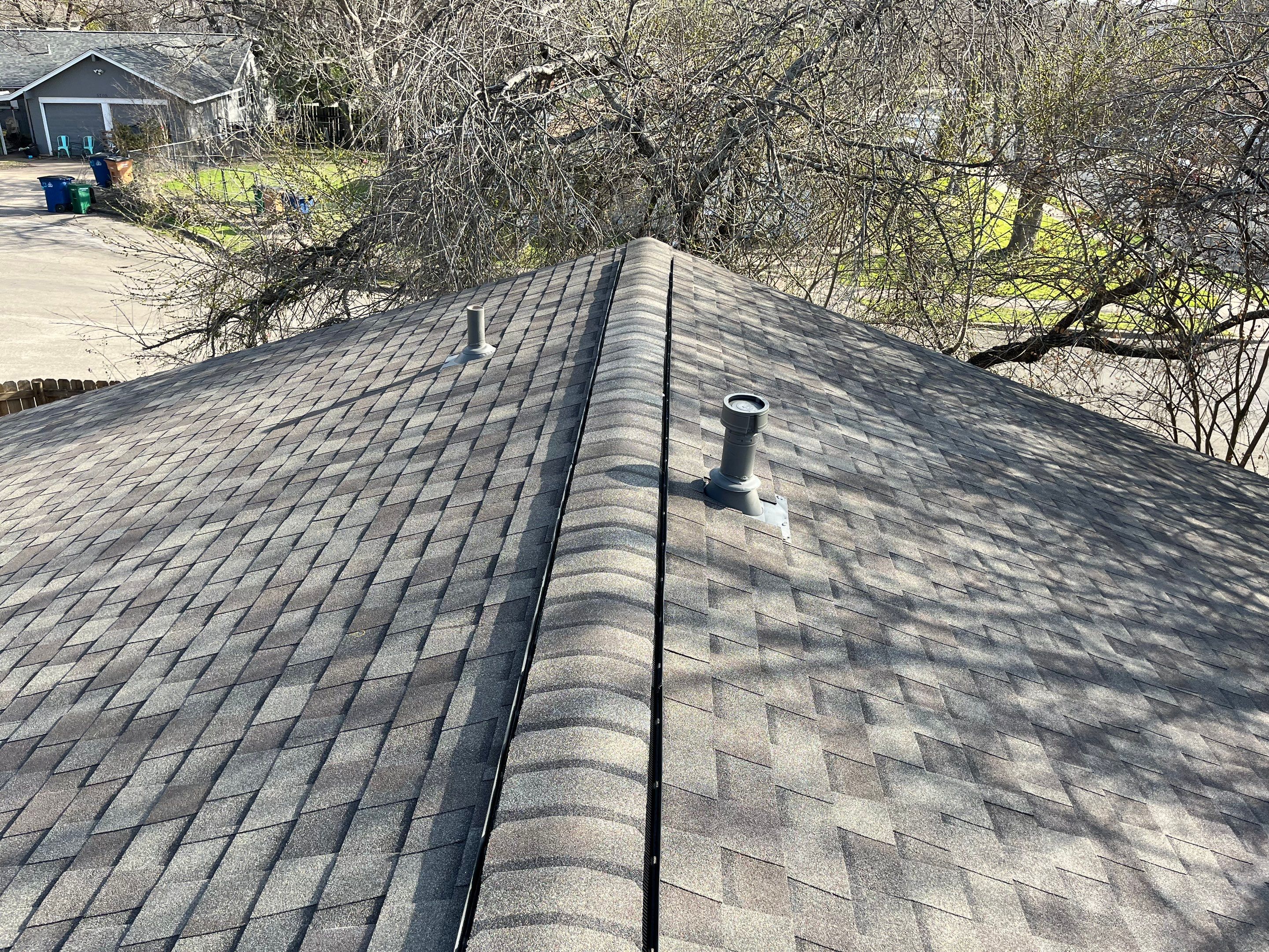 Estate Gray Shingles by Reimagine Roofing