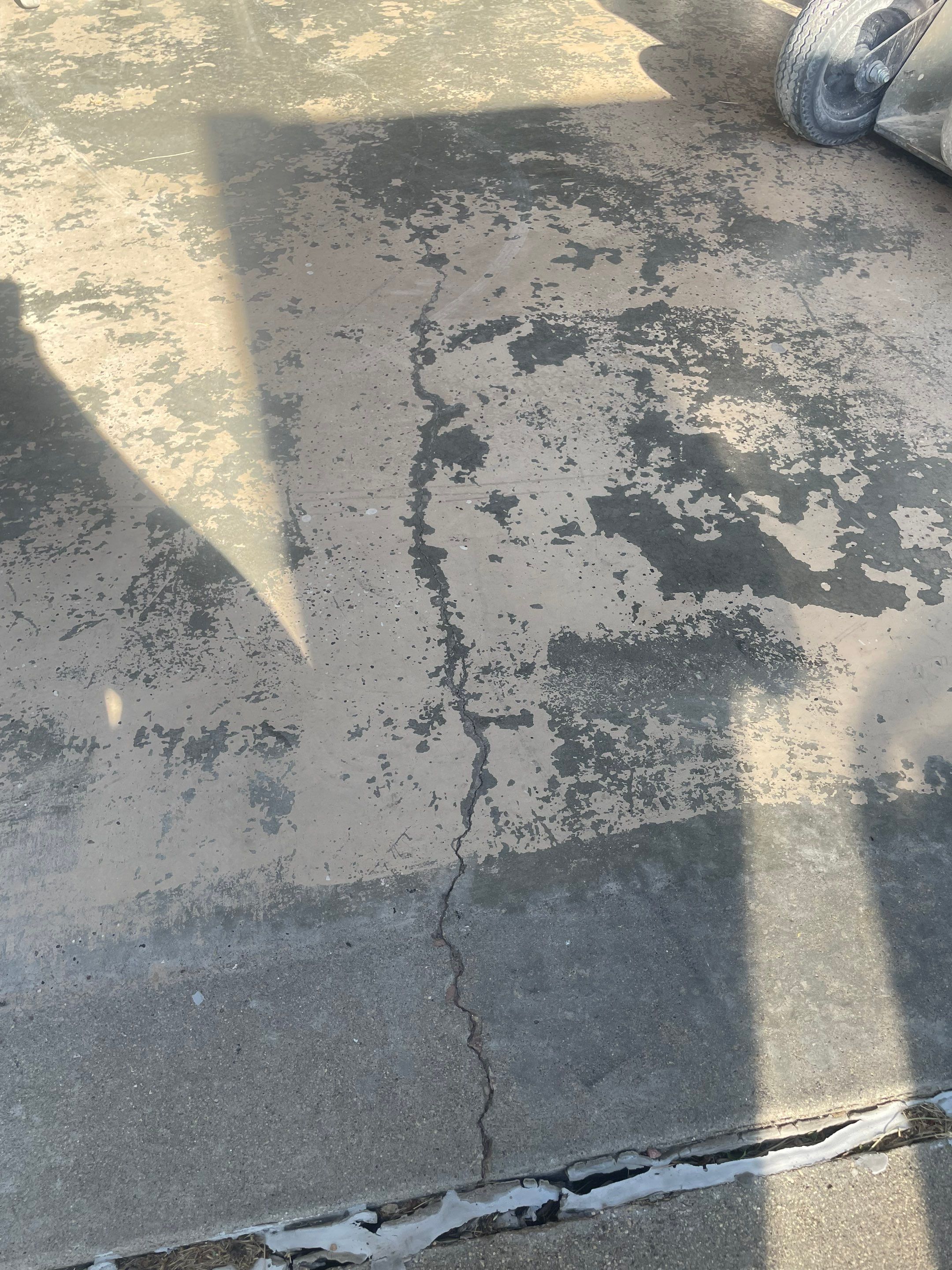 Full Garage Floor Epoxy Coating Installation in Dell Rapids by Select Painting, Coatings & Garage Cabinets