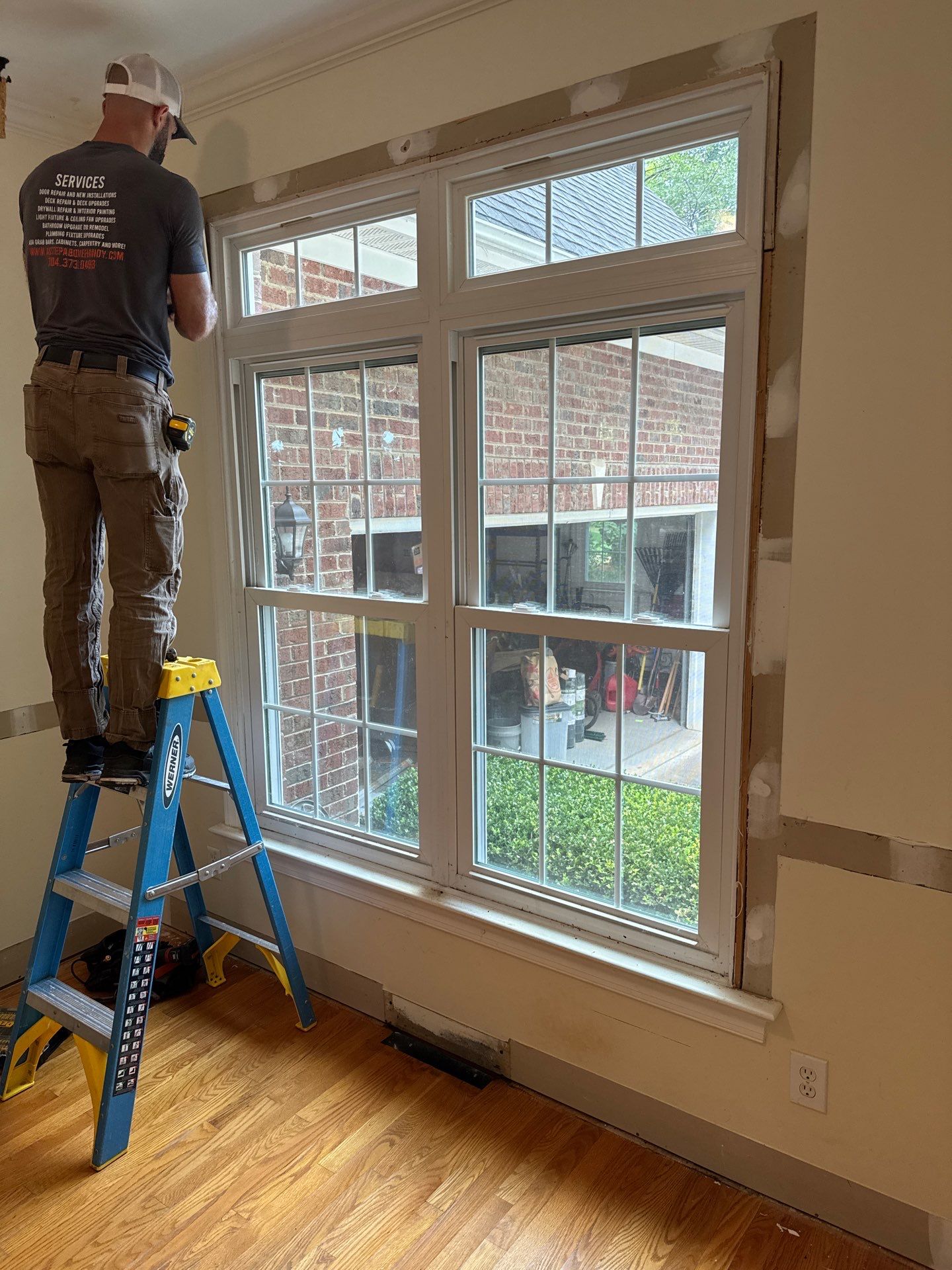 Front Room Transformed into a Waterproof Pet Room by A Step Above Handy LLC 