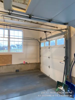 Garage ceiling using open cell spray foam