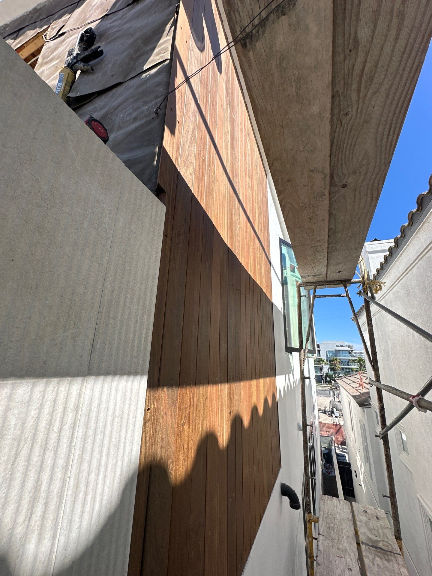 IPE vertical installation by New Era Siding Inc 