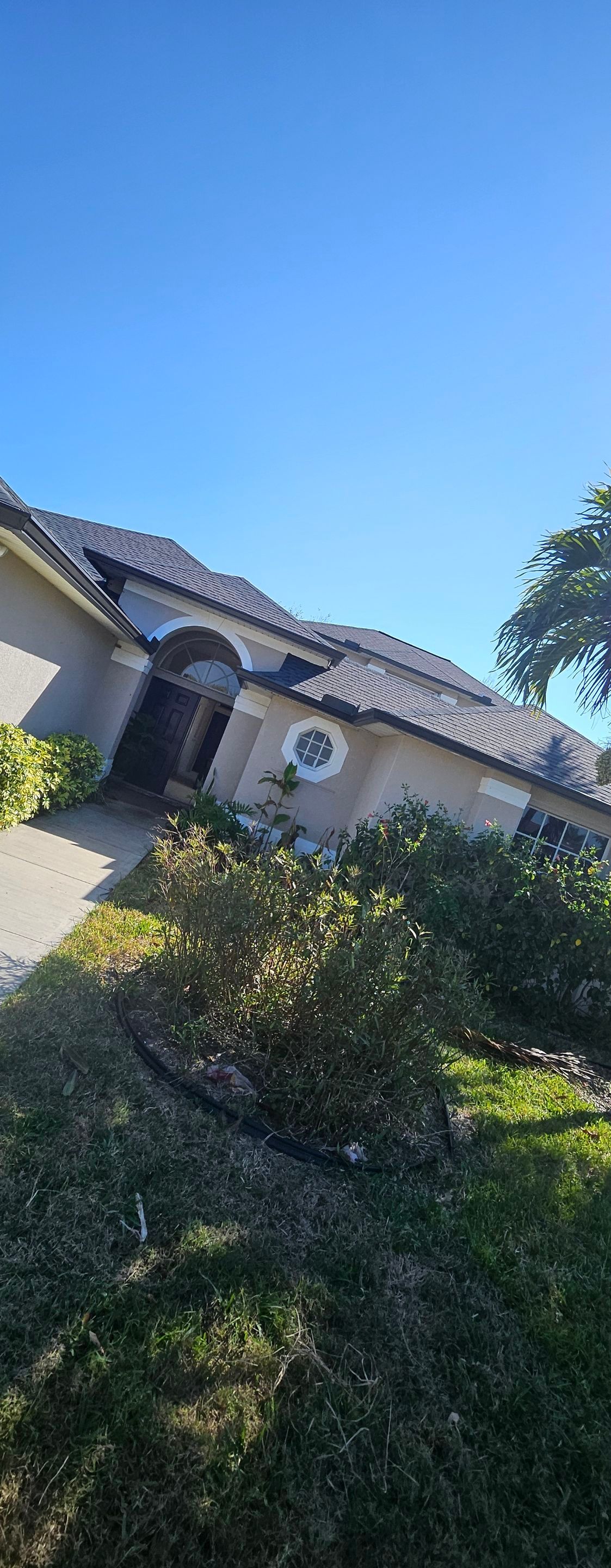 Dark Bronze Seamless Gutters using 6-Inch Seamless Gutters in Cape Coral FL by Gutter Professors