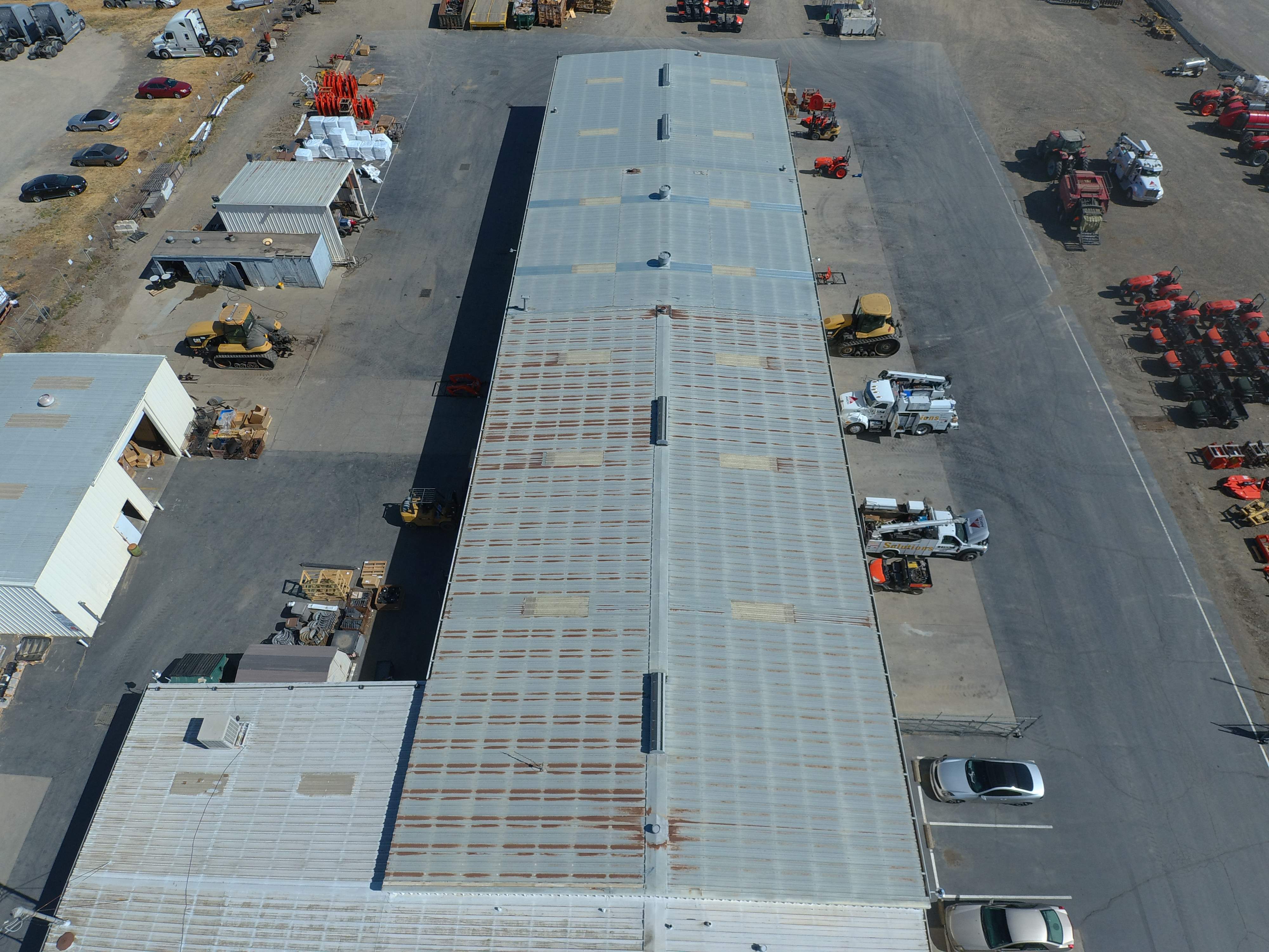 Spray foam and coatings using Conklin Benchmark/PUMA XL coatings and spray foam by Straight Edge Roofing Inc