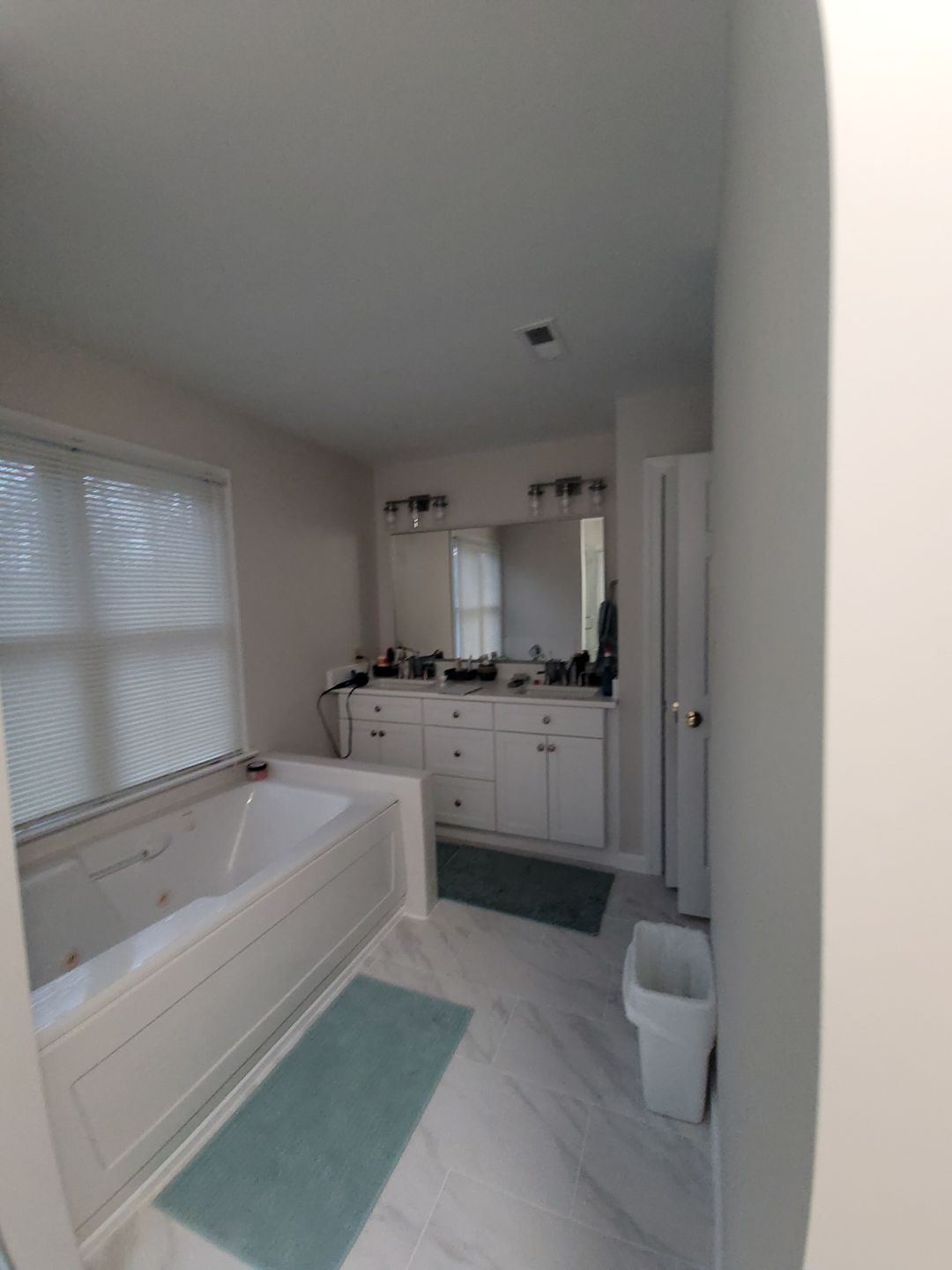 From Cramped & Carpeted to Bright & Modern: A Cary Bathroom Transformation by Elite Remodeling and Design LLC