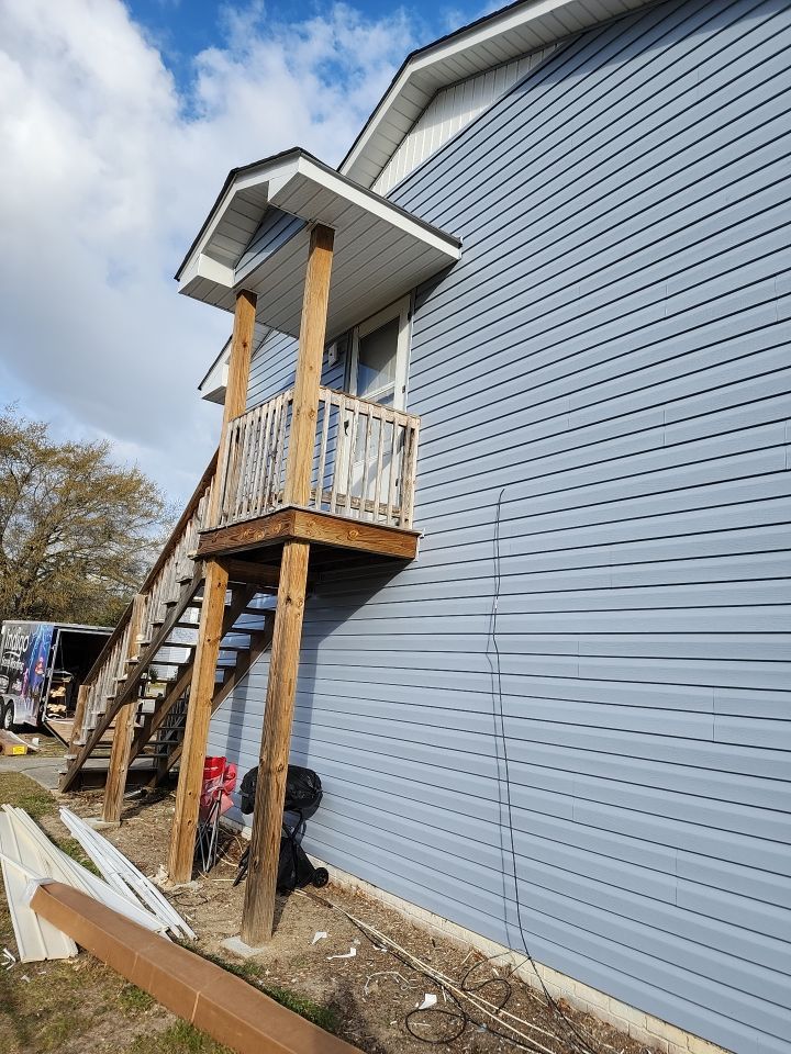 Interior and exterior renovation using Royal Building Products  by Indigo State Roofing