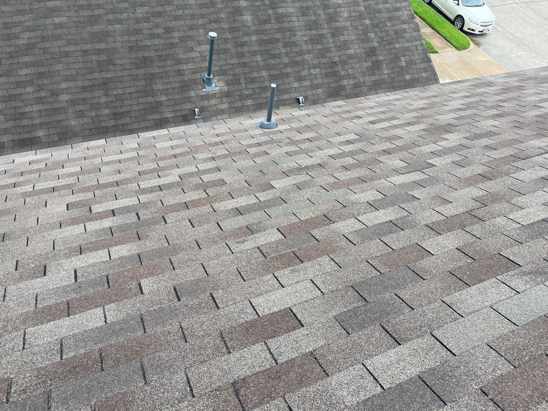 Hail Damage using Owen's Corning Duration (Lifetime) Shingles by Roof Repair Company