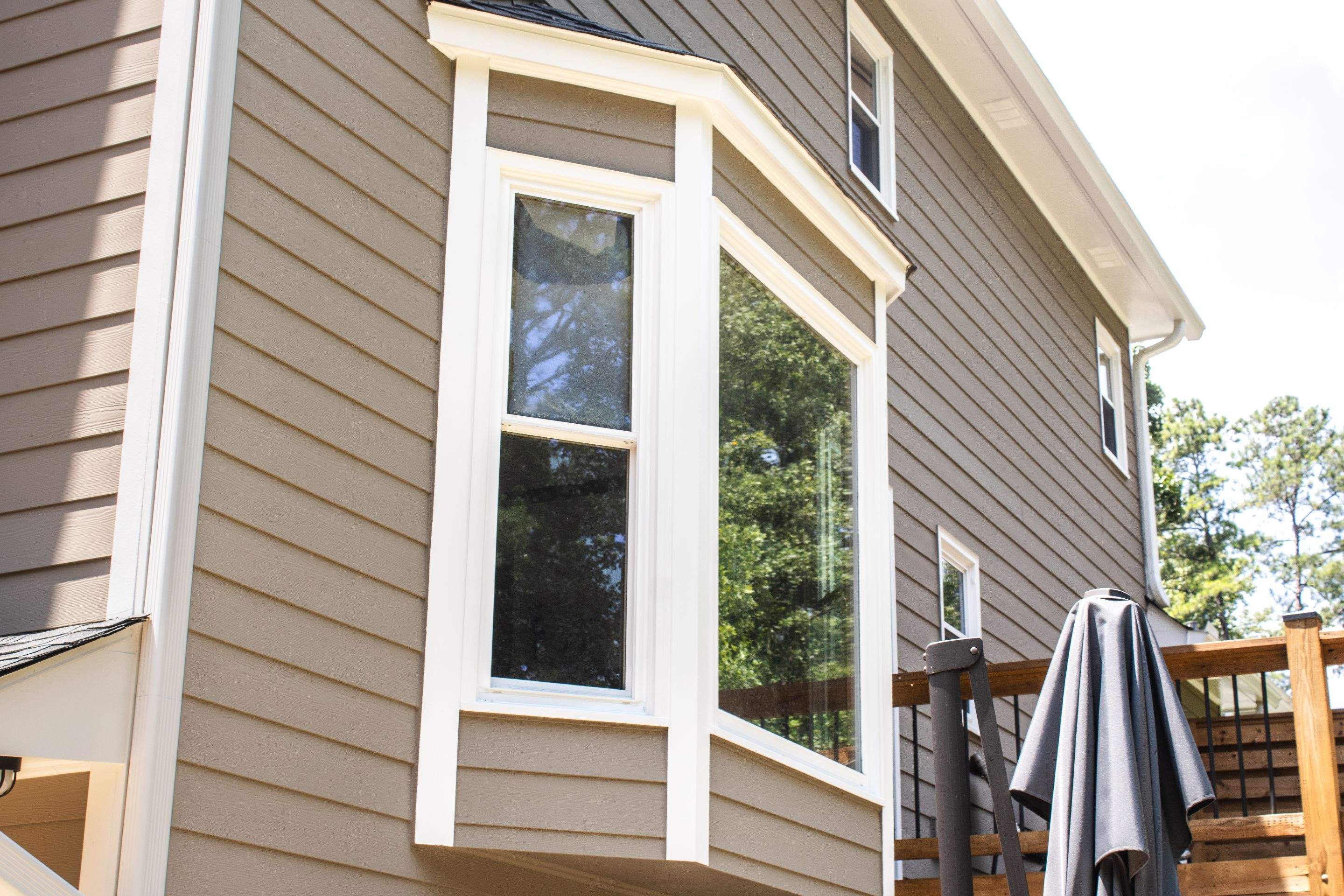 Siding Replacement and Exterior Painting using James Hardie Lap Siding and Sherwin Williams Paint by Nelson Exteriors 