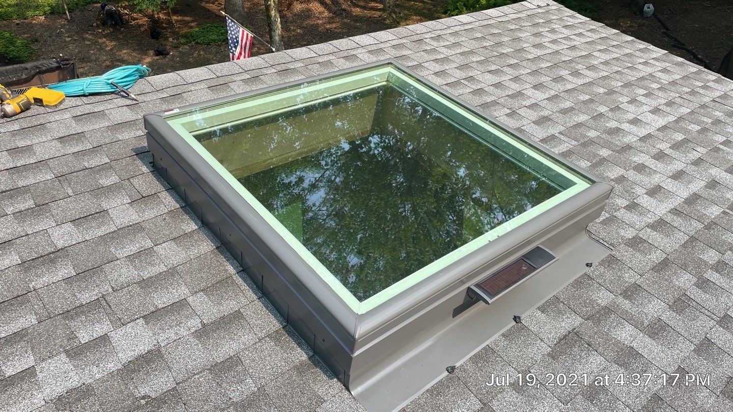 Deckhouse Roof Replacement by American Home Contractors