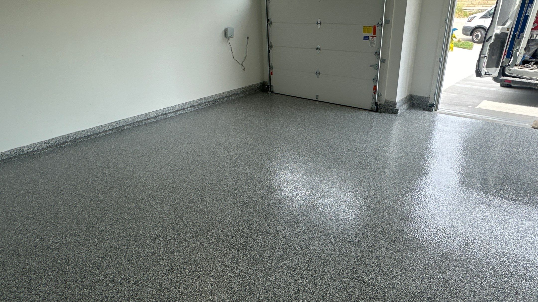 Stonhenge flake floors just look great. Wow!!! by Banner Garage