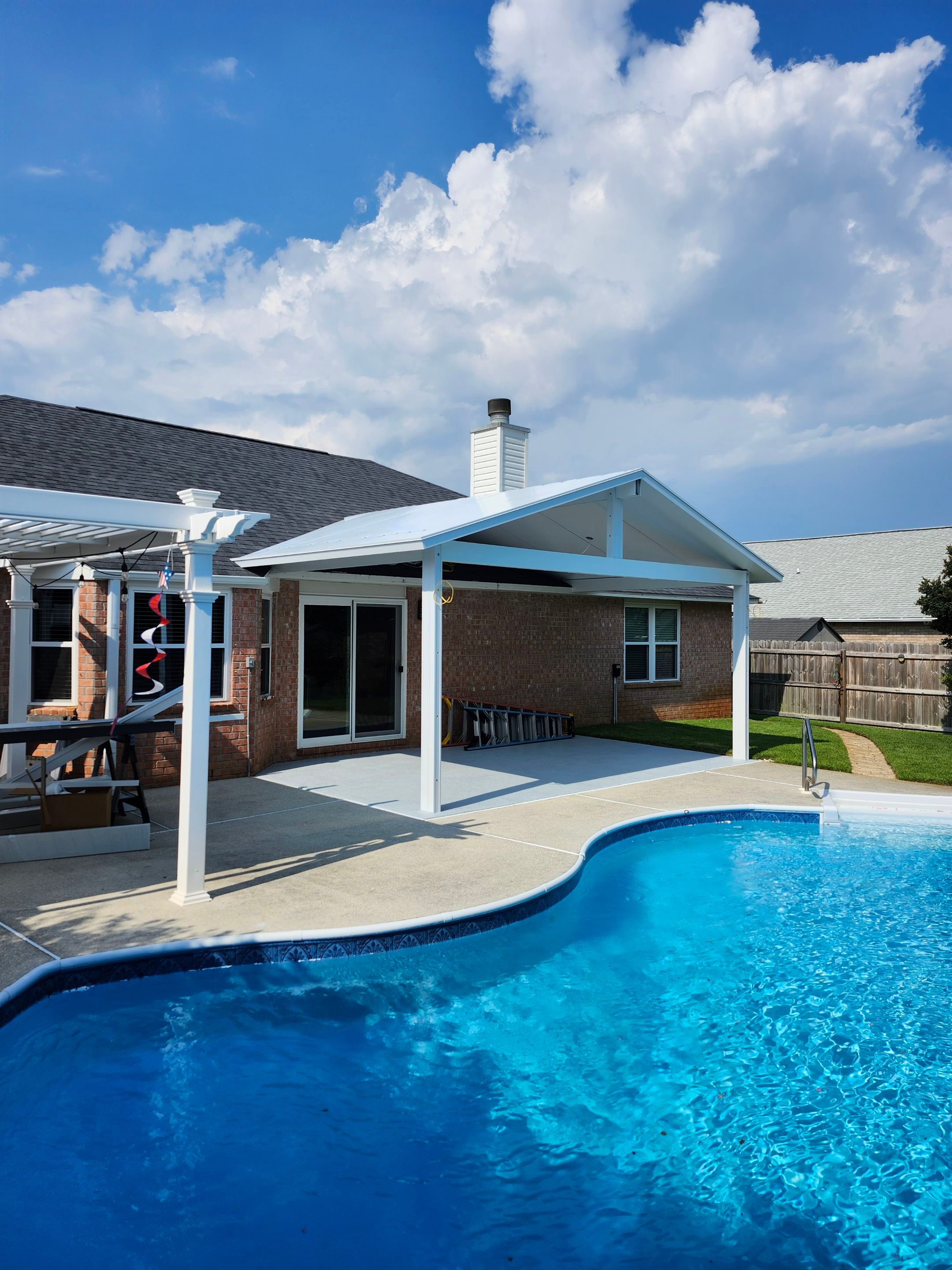 Poolside Cathedral Patio Cover by Titan Sunrooms