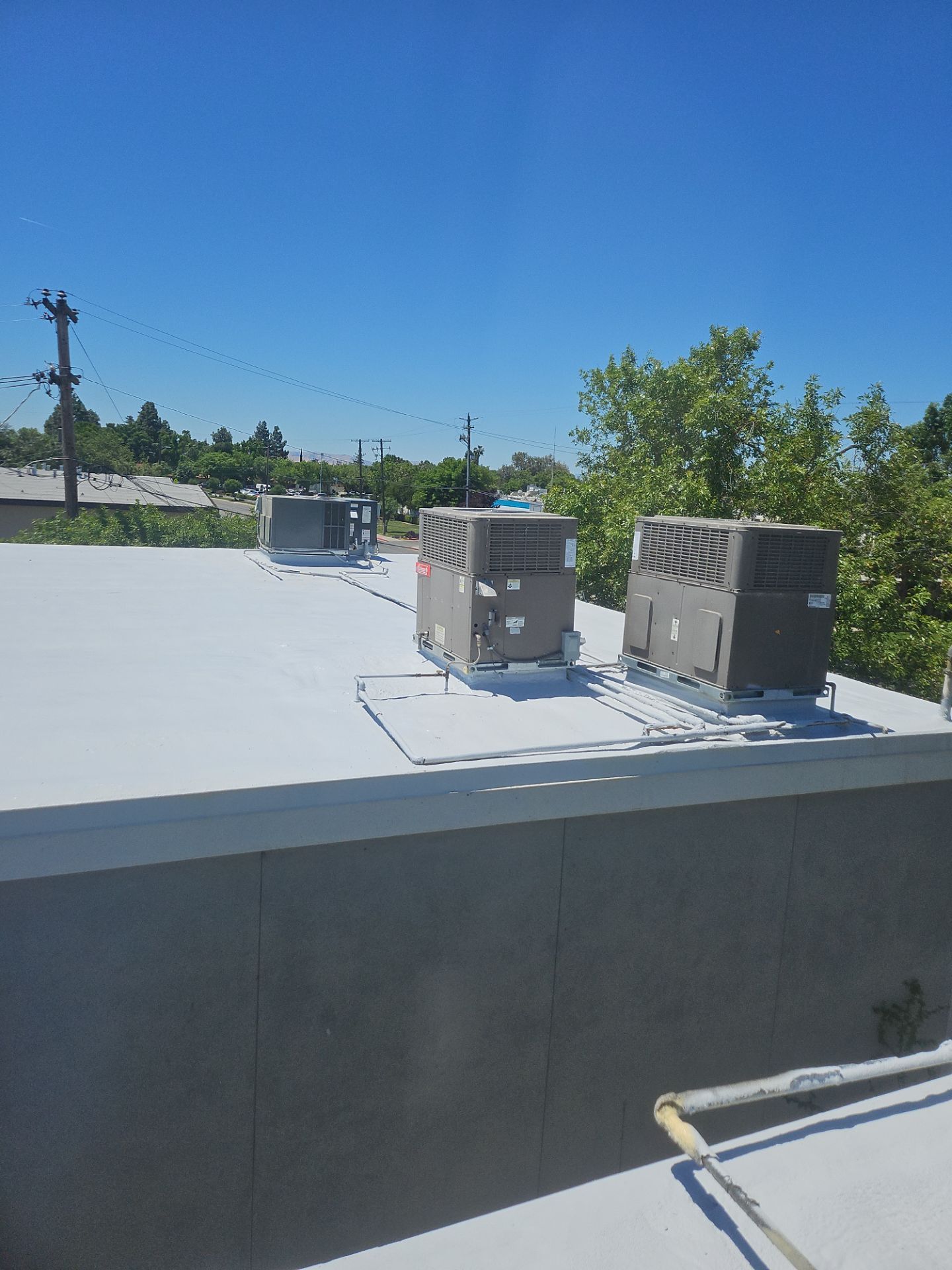 Foam Refurbish using General Coatings acrylic coatings and spray foam by Straight Edge Roofing Inc