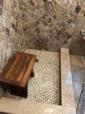 Natural Stone Shower Remodel and Pebble Floor Installation in Louisville