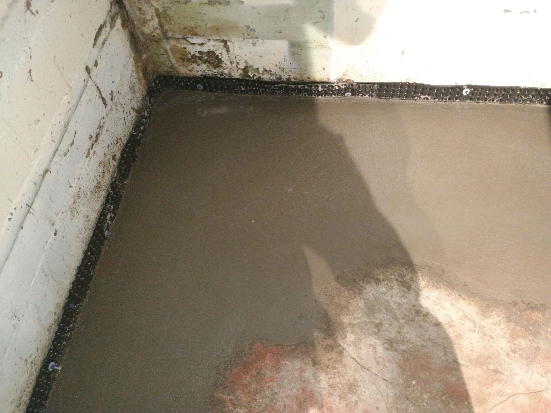 Interior Drain Tile & Sump Pump System in North Minneapolis by Waterproofing Northeast