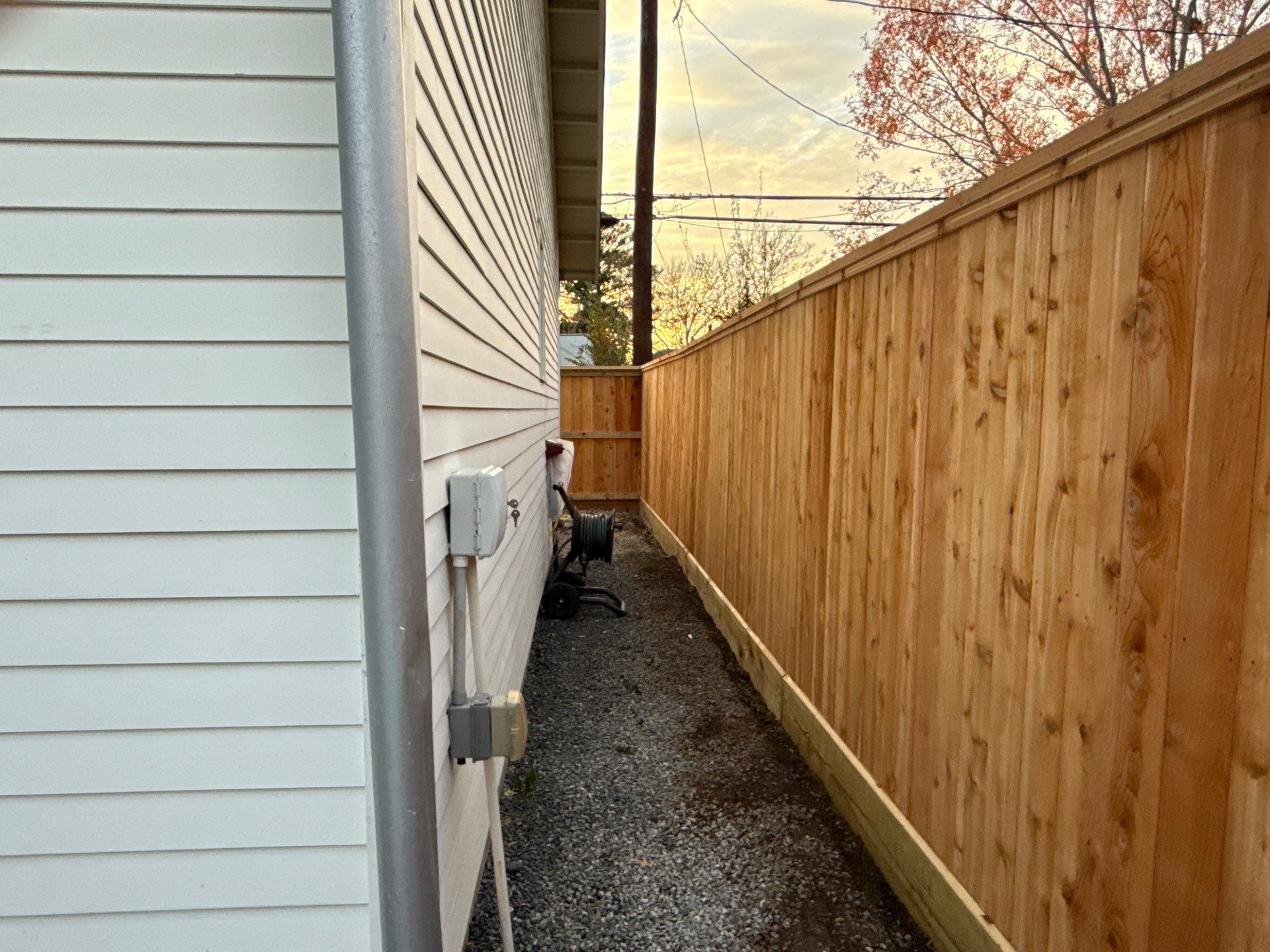 Durable Fence & Gate Installation with Premium Stain by Tim's Fences